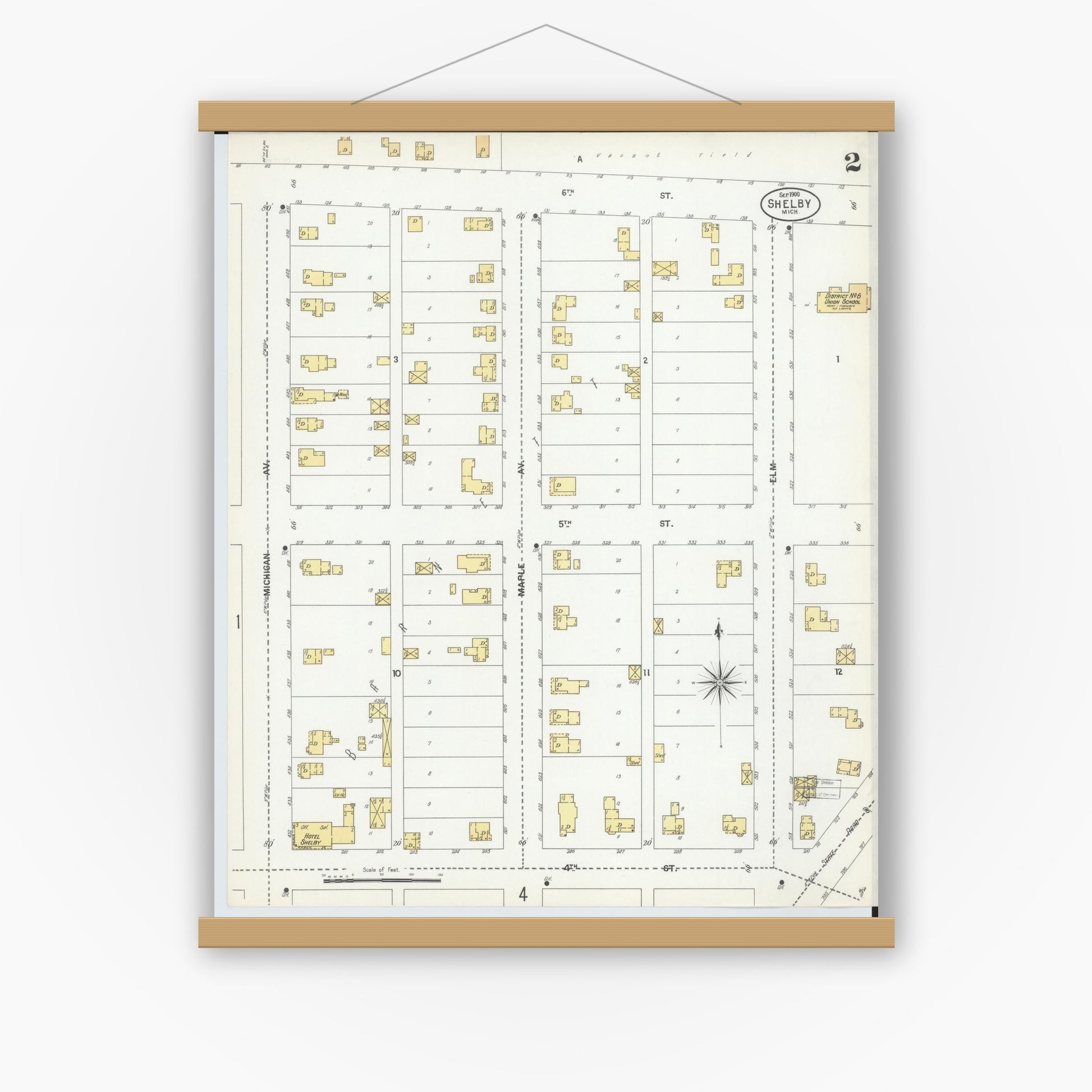 Old map wall art mockup — magnetic wood frame on white wall — Sanborn Fire Insurance Map from Shelby, Oceana County, Michigan (1900), Sheet #0002