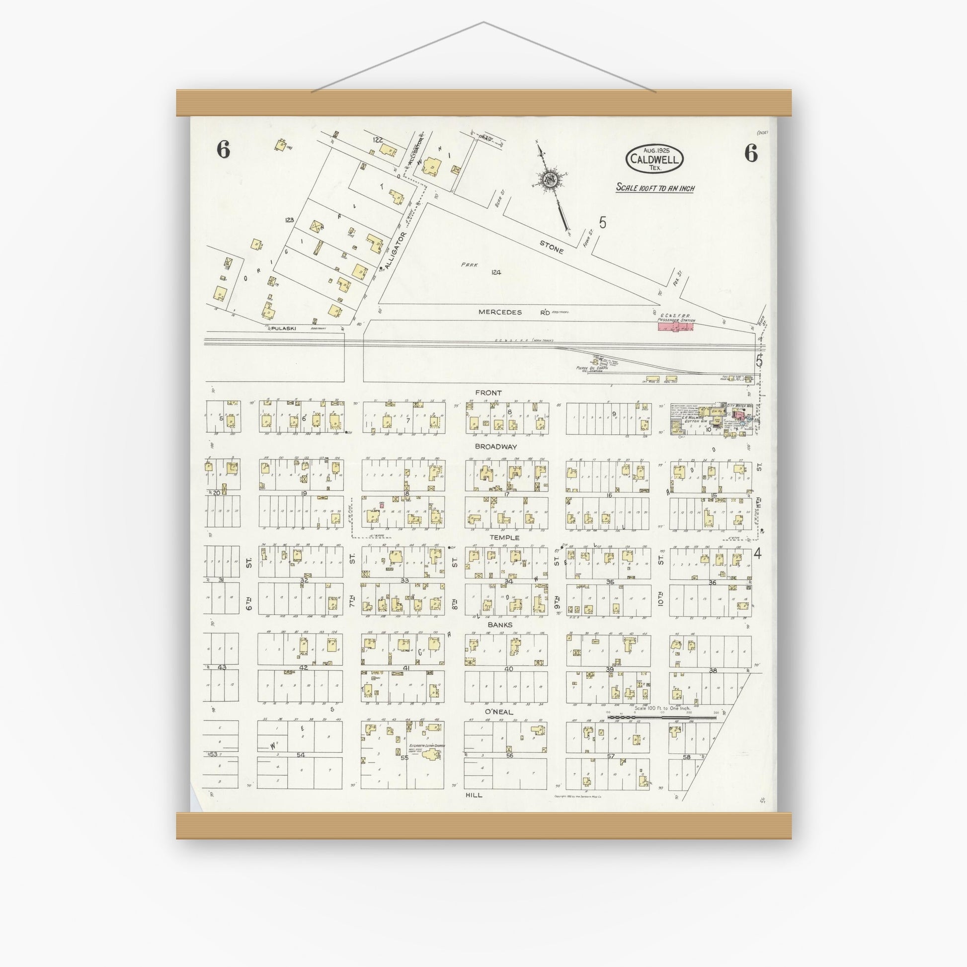 Old map wall art mockup — magnetic wood frame on white wall — Sanborn Fire Insurance Map from Caldwell, Burleson County, Texas (1925), Sheet #0006