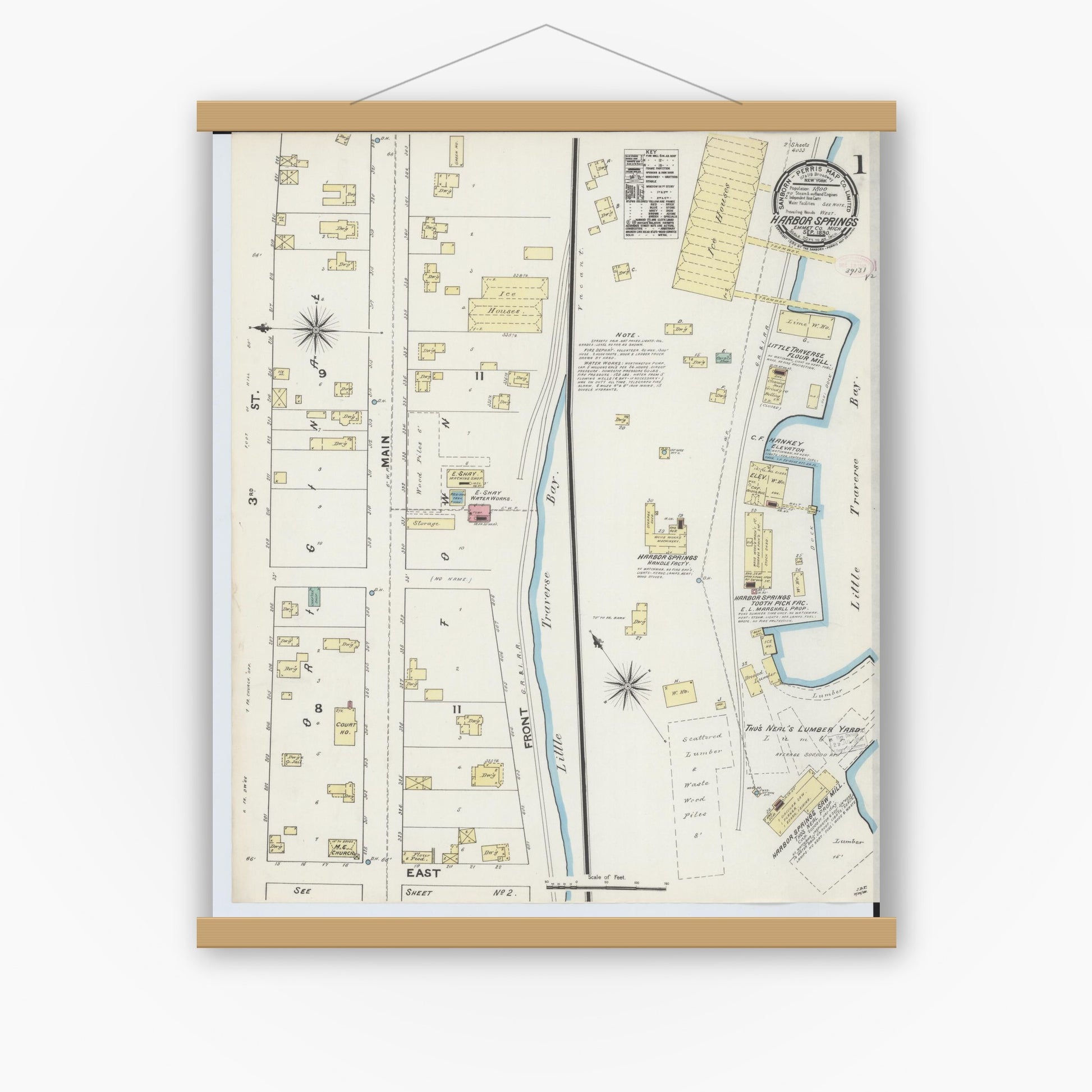 Old map wall art mockup — magnetic wood frame on white wall — Sanborn Fire Insurance Map from Harbor Springs, Emmet County, Michigan (1890) - Complete Map Set