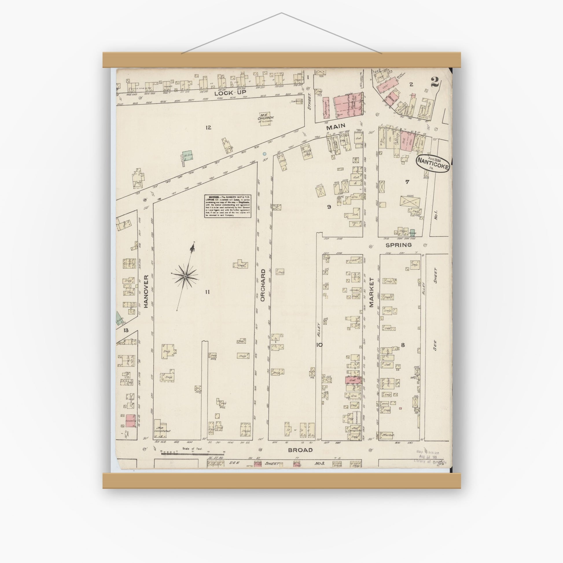 Old map wall art mockup — magnetic wood frame on white wall — Sanborn Fire Insurance Map from Nanticoke, Luzerne County, Pennsylvania (1884), Sheet #0002