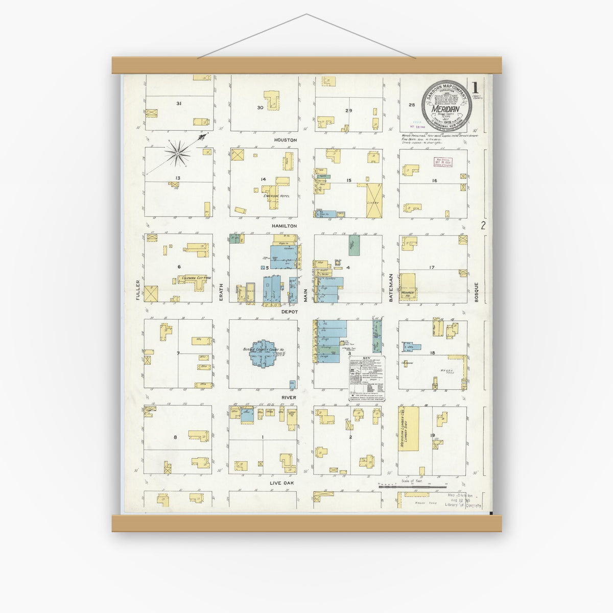 Old map wall art mockup — magnetic wood frame on white wall — Sanborn Fire Insurance Map from Meridian, Bosque County, Texas (1909) - Complete Map Set
