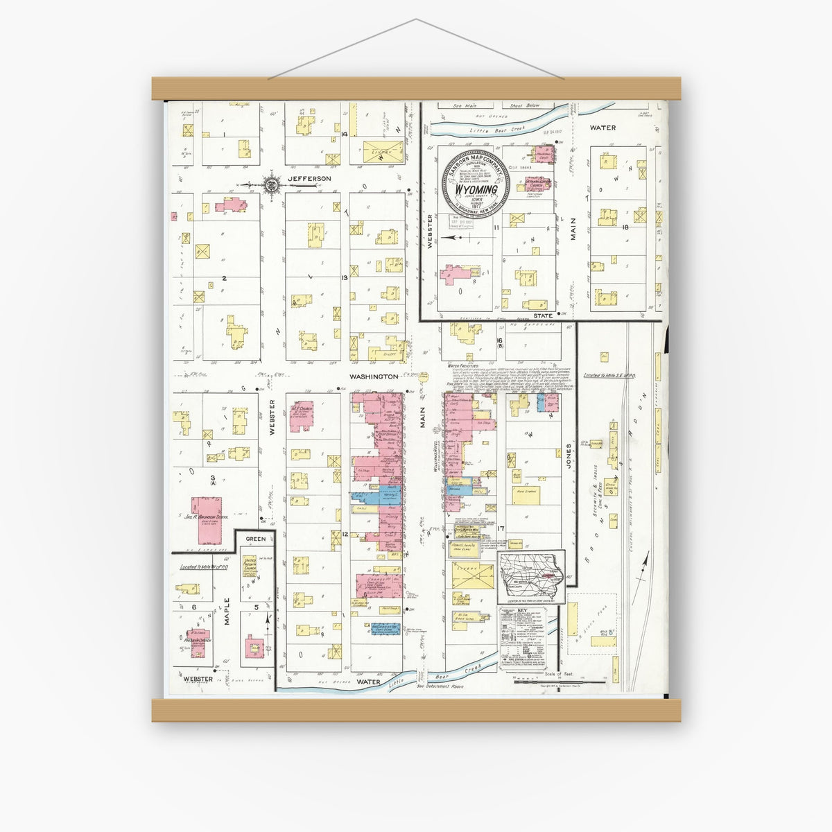 Old map wall art mockup — magnetic wood frame on white wall — Sanborn Fire Insurance Map from Wyoming, Jones County, Iowa (1917), Sheet #0001