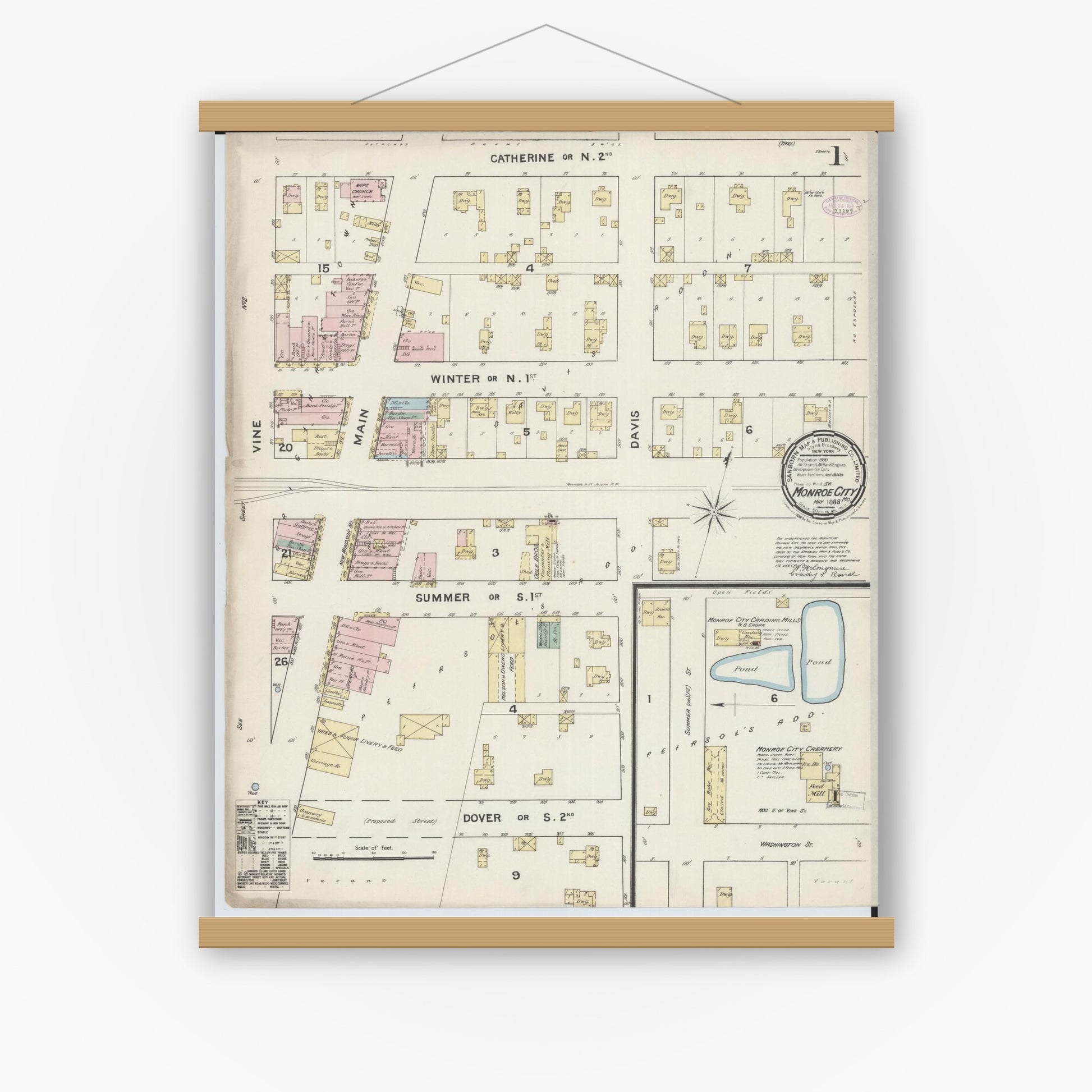 Old map wall art mockup — magnetic wood frame on white wall — Sanborn Fire Insurance Map from Monroe City, Monroe County, Missouri (1888) - Complete Map Set