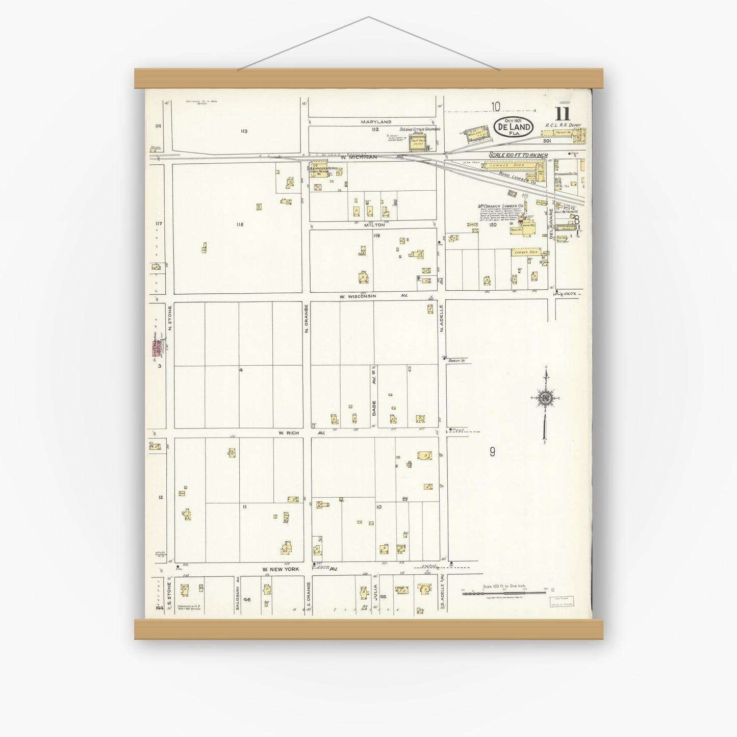 Old map wall art mockup — magnetic wood frame on white wall — Sanborn Fire Insurance Map from De Land, Volusia County, Florida (1921), Sheet #0011
