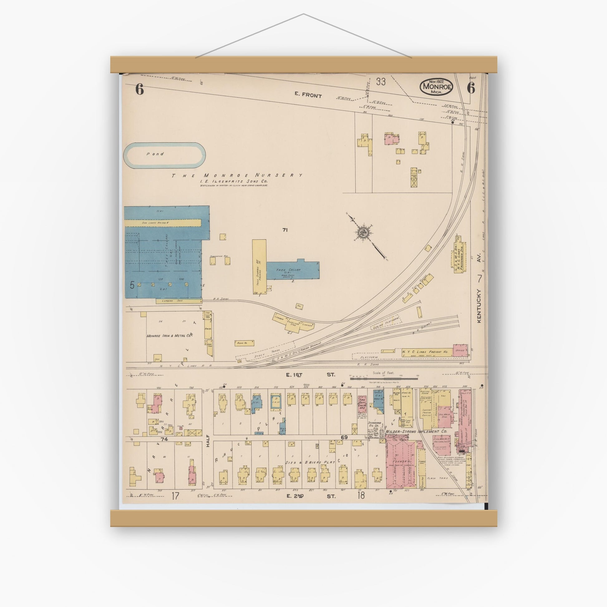 Old map wall art mockup — magnetic wood frame on white wall — Sanborn Fire Insurance Map from Monroe, Monroe County, Michigan (1922), Sheet #0006