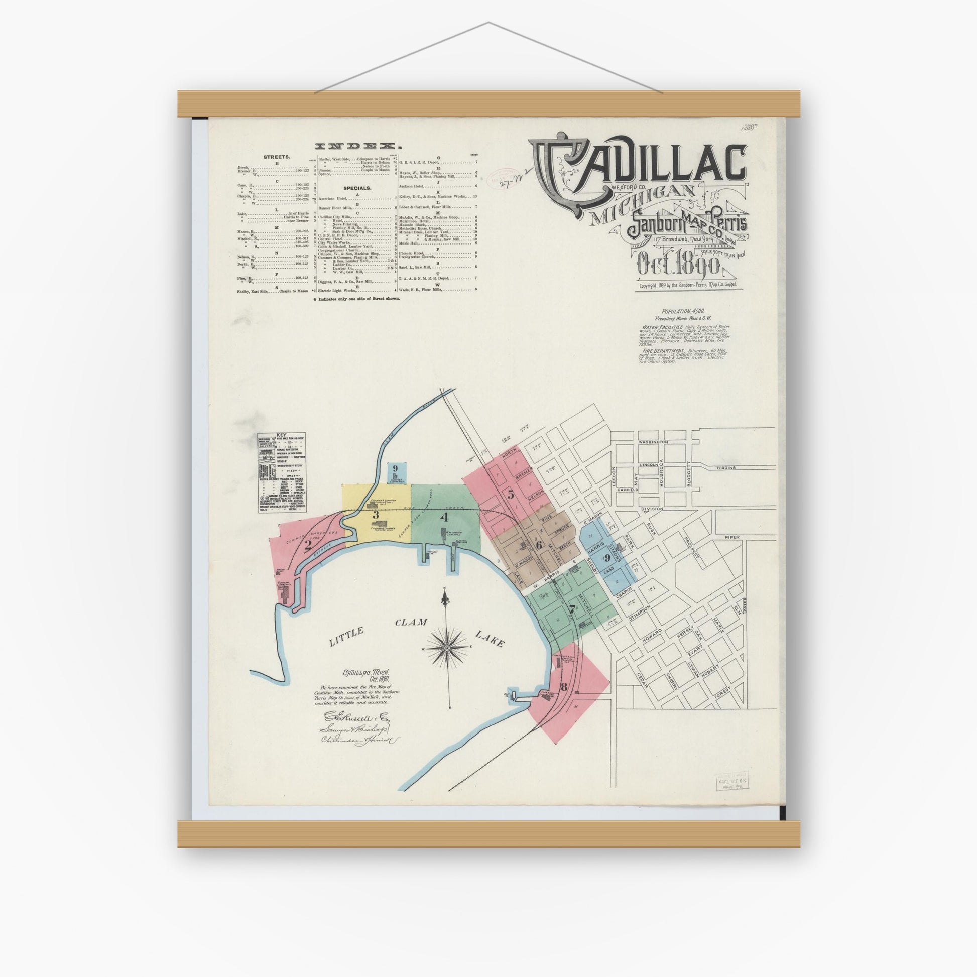 Old map wall art mockup — magnetic wood frame on white wall — Sanborn Fire Insurance Map from Cadillac, Wexford County, Michigan (1890), Sheet #0001