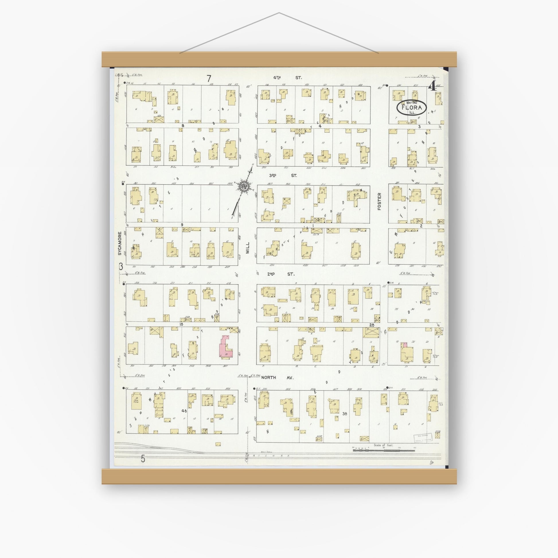 Old map wall art mockup — magnetic wood frame on white wall — Sanborn Fire Insurance Map from Flora, Clay County, Illinois (1912), Sheet #0004