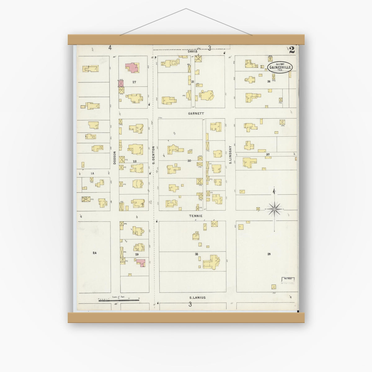 Old map wall art mockup — magnetic wood frame on white wall — Sanborn Fire Insurance Map from Gainesville, Cooke County, Texas (1897), Sheet #0002