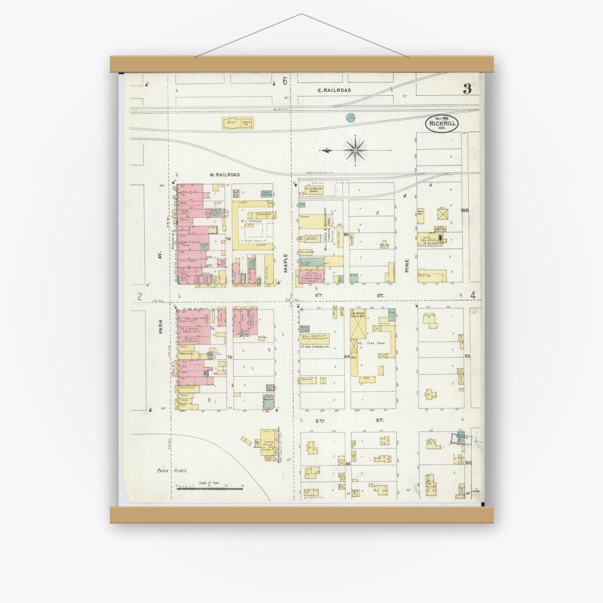 Old map wall art mockup — magnetic wood frame on white wall — Sanborn Fire Insurance Map from Rich Hill, Bates County, Missouri (1906), Sheet #0003