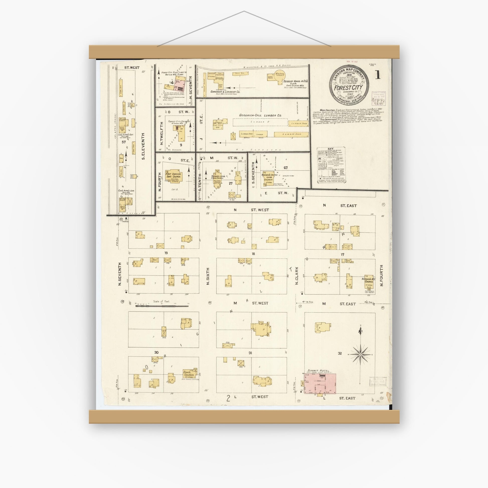 Old map wall art mockup — magnetic wood frame on white wall — Sanborn Fire Insurance Map from Forest City, Winnebago County, Iowa (1907) â€” Complete Set