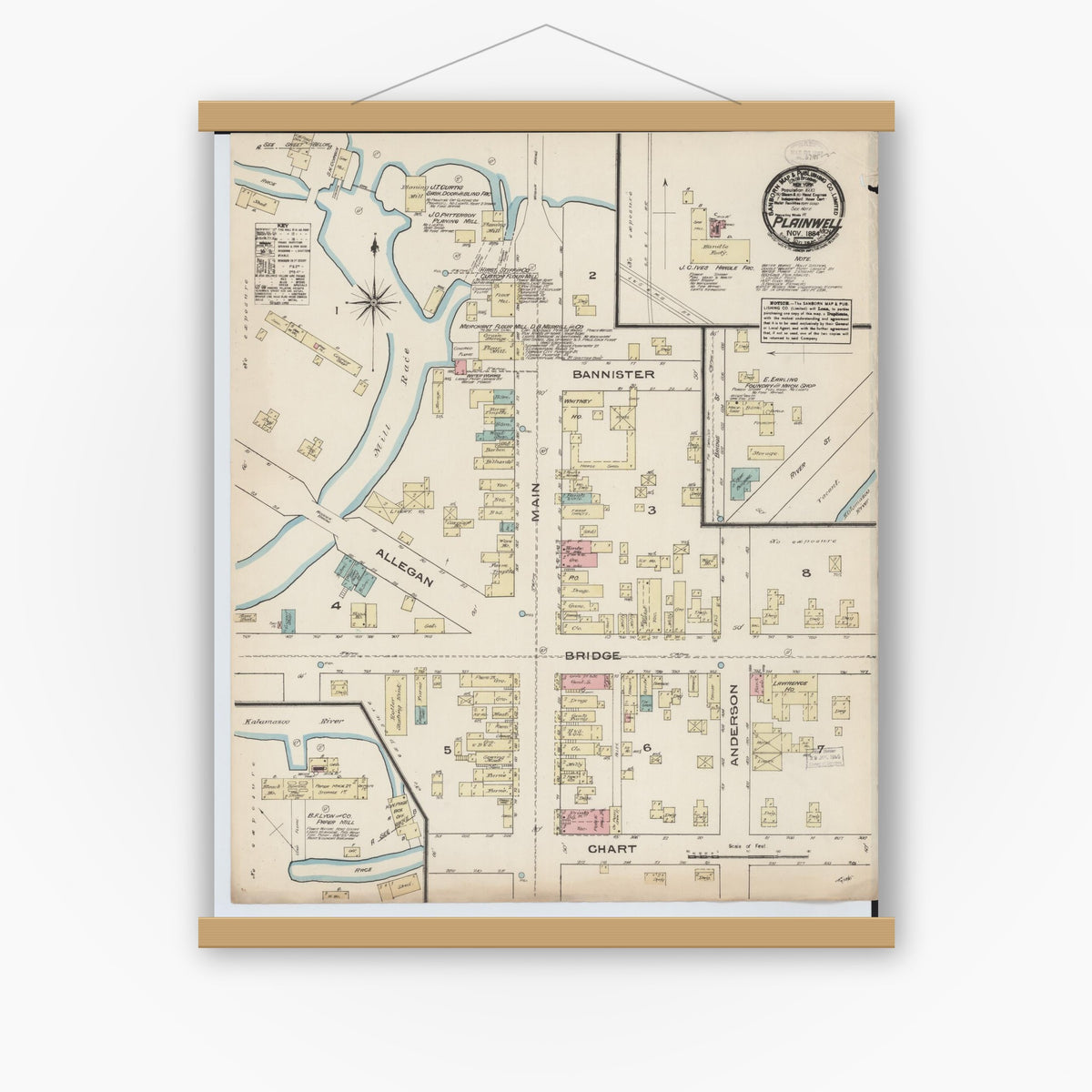 Old map wall art mockup — magnetic wood frame on white wall — Sanborn Fire Insurance Map from Plainwell, Allegan County, Michigan (1884), Sheet #0001