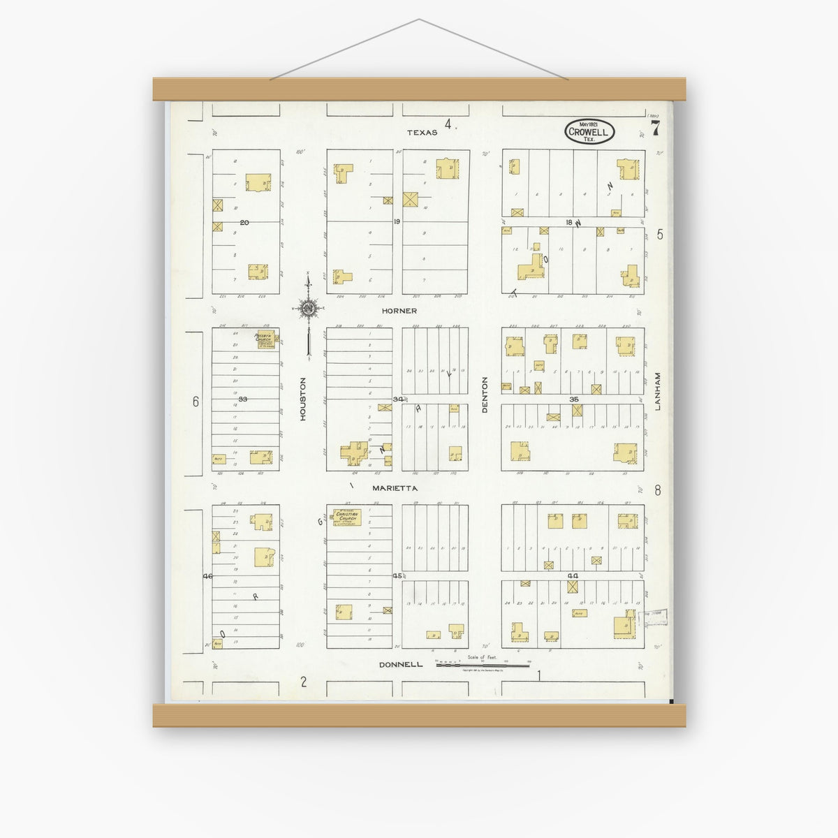 Old map wall art mockup — magnetic wood frame on white wall — Sanborn Fire Insurance Map from Crowell, Foard County, Texas (1921), Sheet #0007