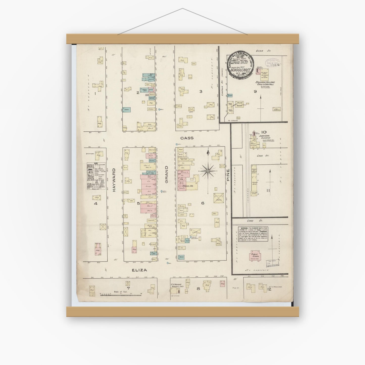 Old map wall art mockup — magnetic wood frame on white wall — Sanborn Fire Insurance Map from Schoolcraft, Kalamazoo County, Michigan (1884), Sheet #0001