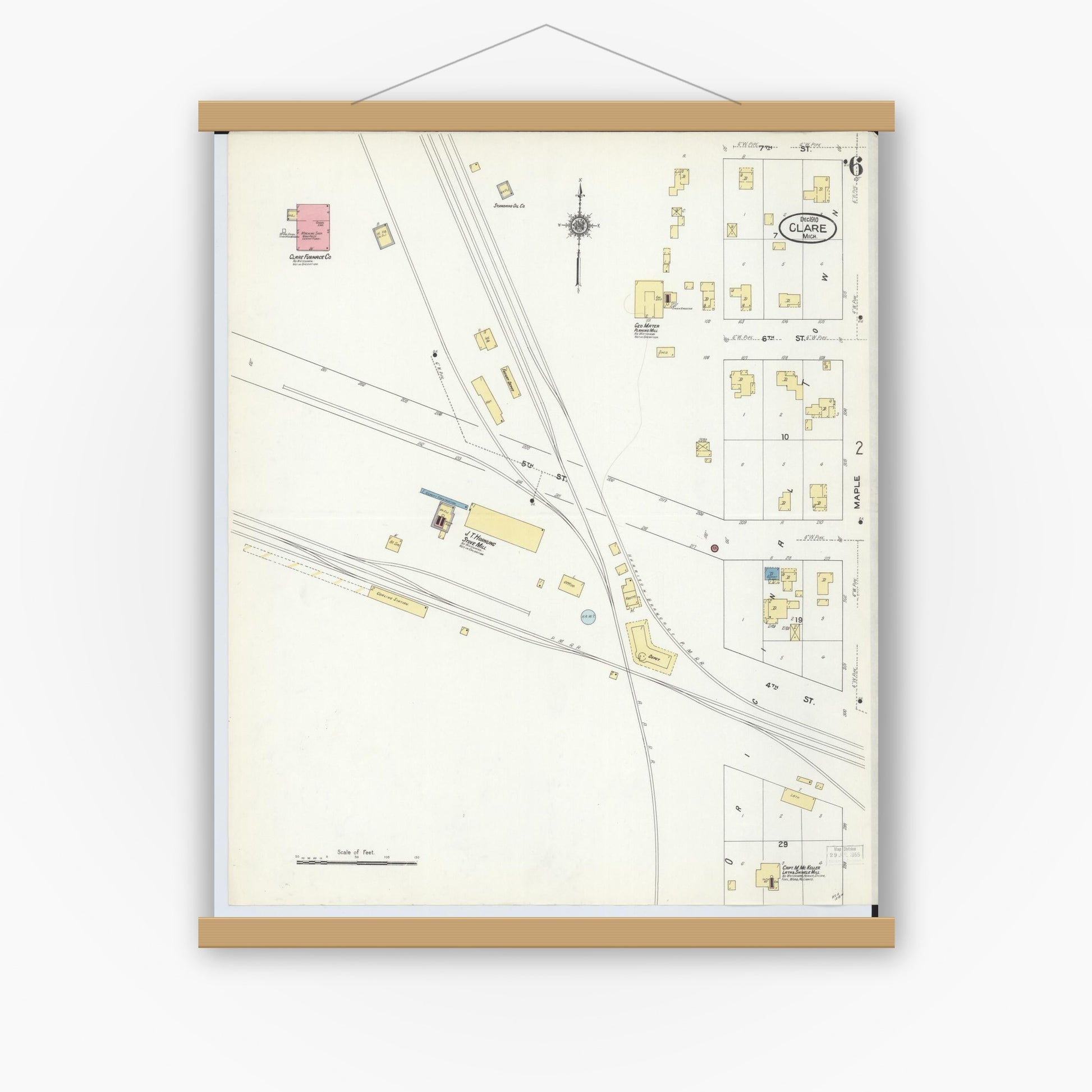 Old map wall art mockup — magnetic wood frame on white wall — Sanborn Fire Insurance Map from Clare, Clare County, Michigan (1910), Sheet #0006