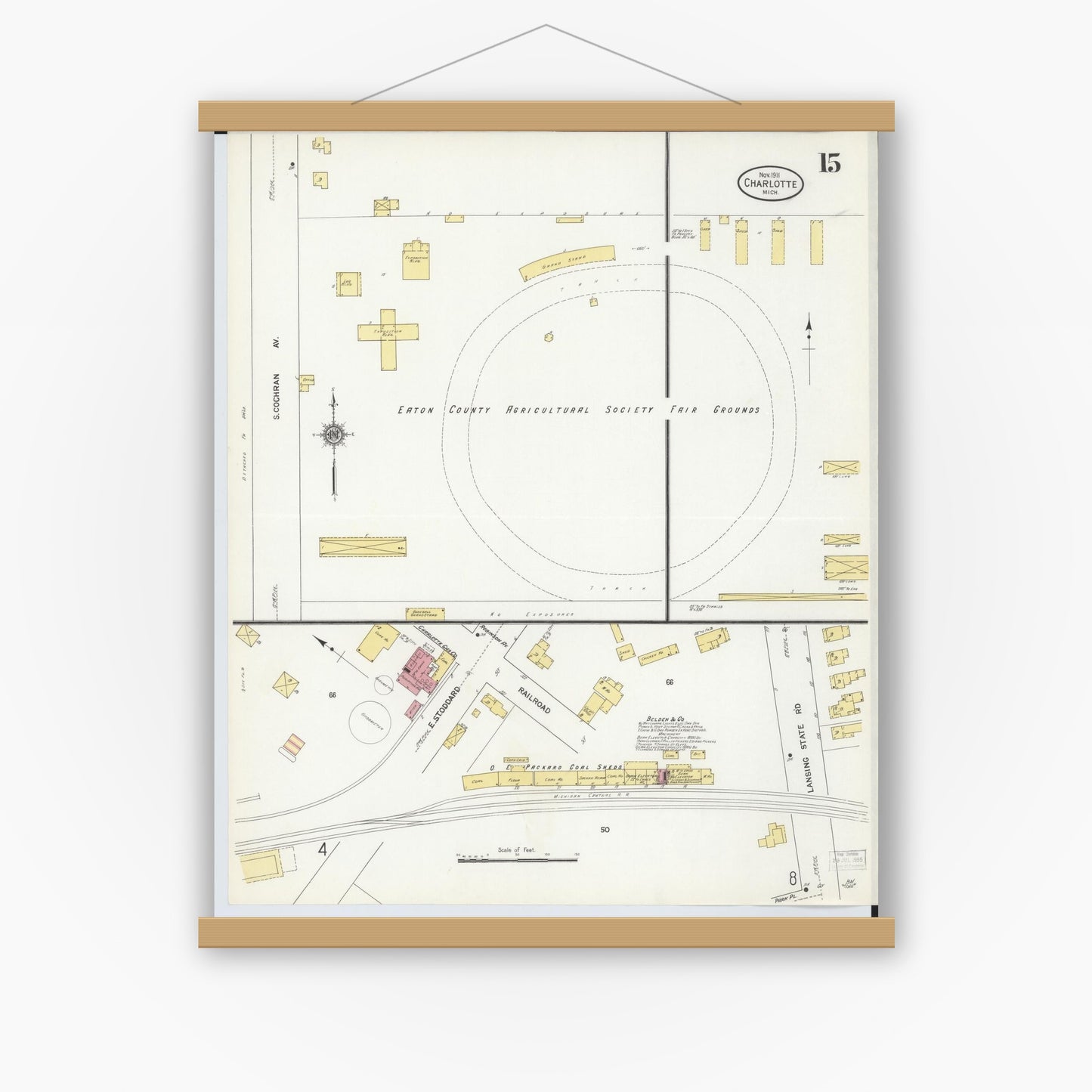 Old map wall art mockup — magnetic wood frame on white wall — Sanborn Fire Insurance Map from Charlotte, Eaton County, Michigan (1911), Sheet #0015