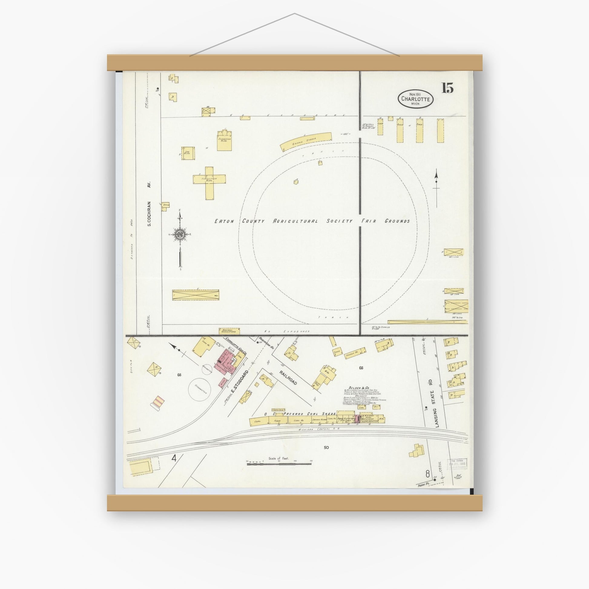 Old map wall art mockup — magnetic wood frame on white wall — Sanborn Fire Insurance Map from Charlotte, Eaton County, Michigan (1911), Sheet #0015