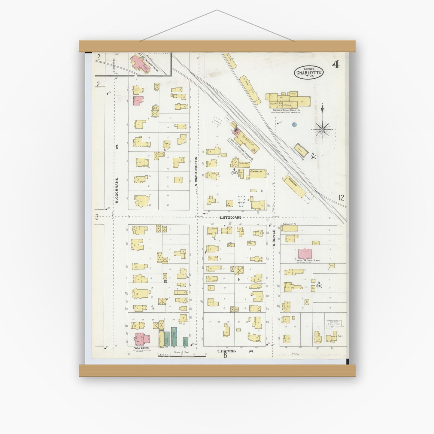 Old map wall art mockup — magnetic wood frame on white wall — Sanborn Fire Insurance Map from Charlotte, Eaton County, Michigan (1904), Sheet #0004