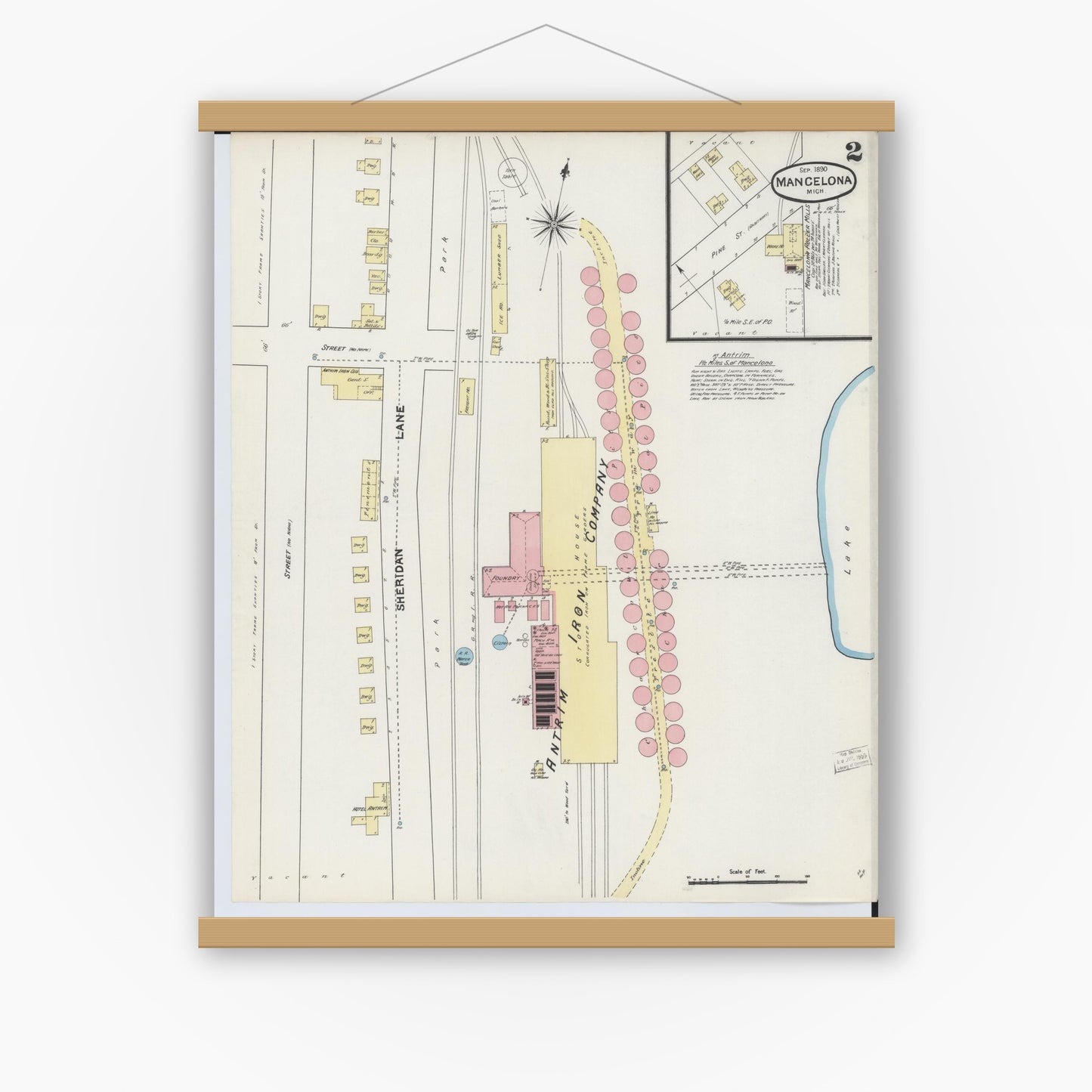Old map wall art mockup — magnetic wood frame on white wall — Sanborn Fire Insurance Map from Mancelona, Antrim County, Michigan (1890), Sheet #0002