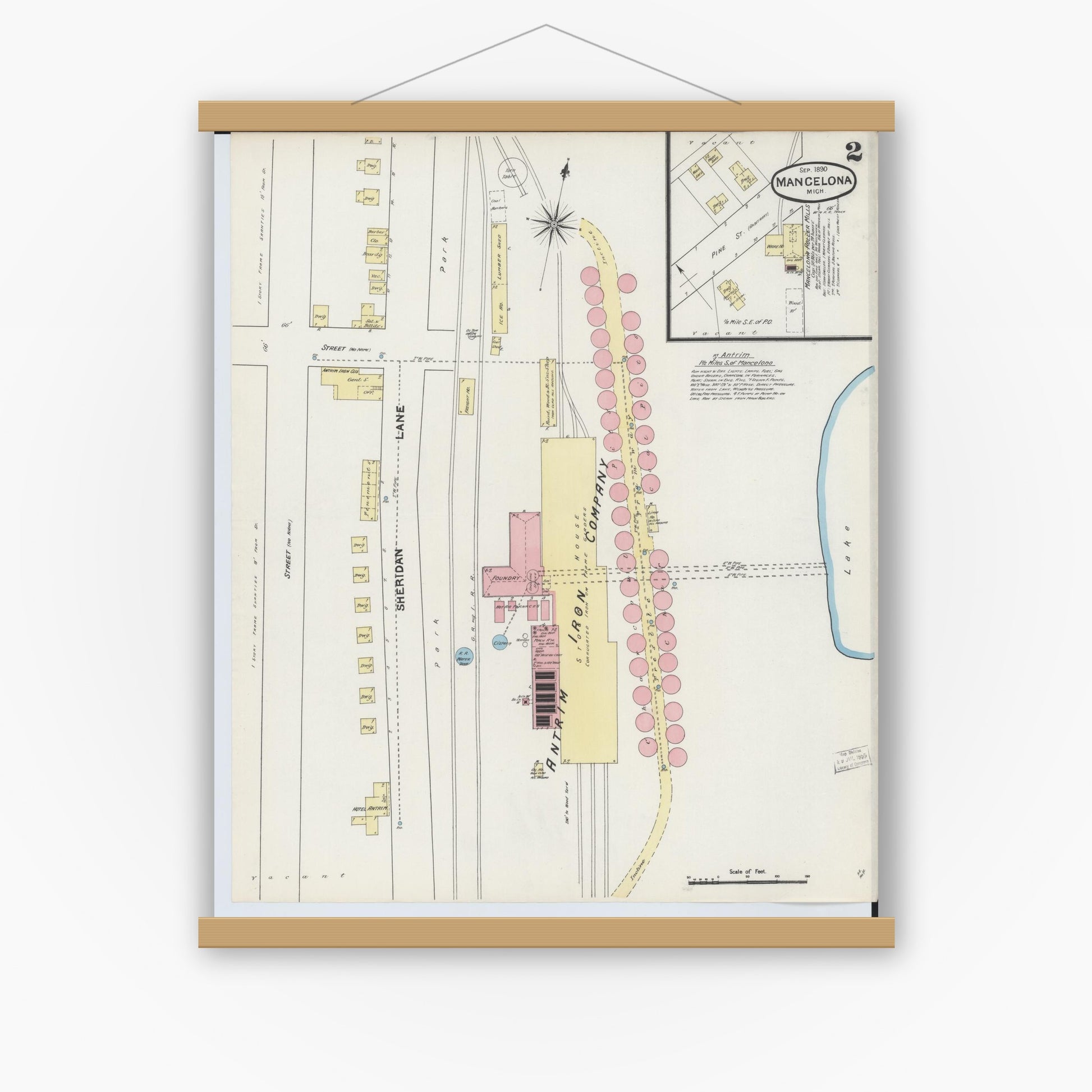 Old map wall art mockup — magnetic wood frame on white wall — Sanborn Fire Insurance Map from Mancelona, Antrim County, Michigan (1890), Sheet #0002