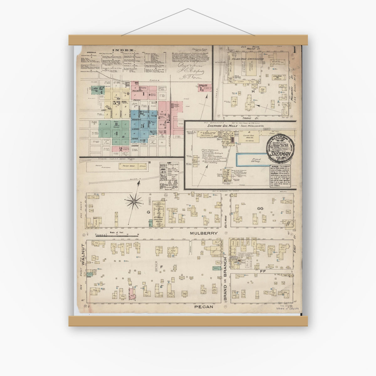 Old map wall art mockup — magnetic wood frame on white wall — Sanborn Fire Insurance Map from Sherman, Grayson County, Texas (1885), Sheet #0001