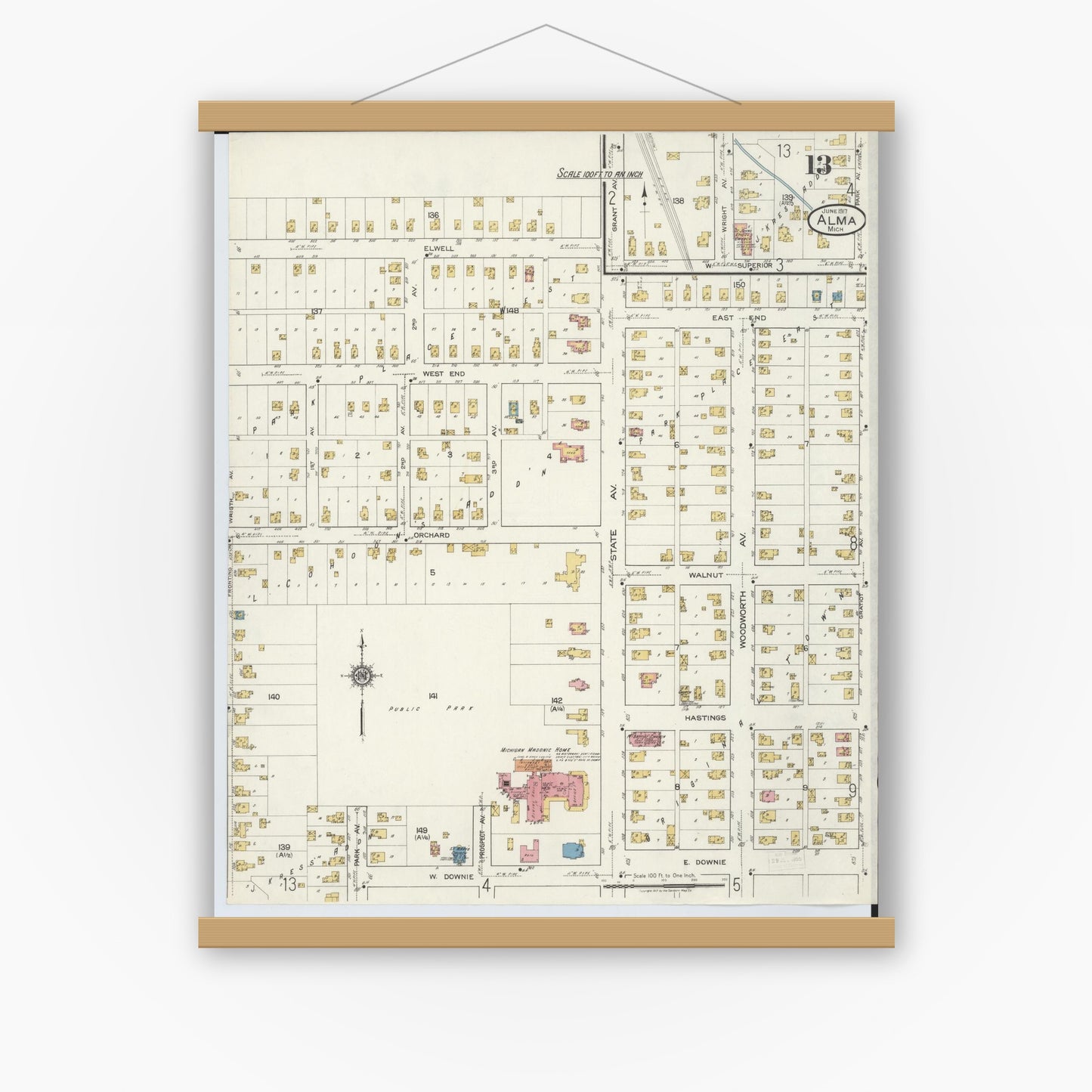 Old map wall art mockup — magnetic wood frame on white wall — Sanborn Fire Insurance Map from Alma, Gratiot County, Michigan (1917), Sheet #0013