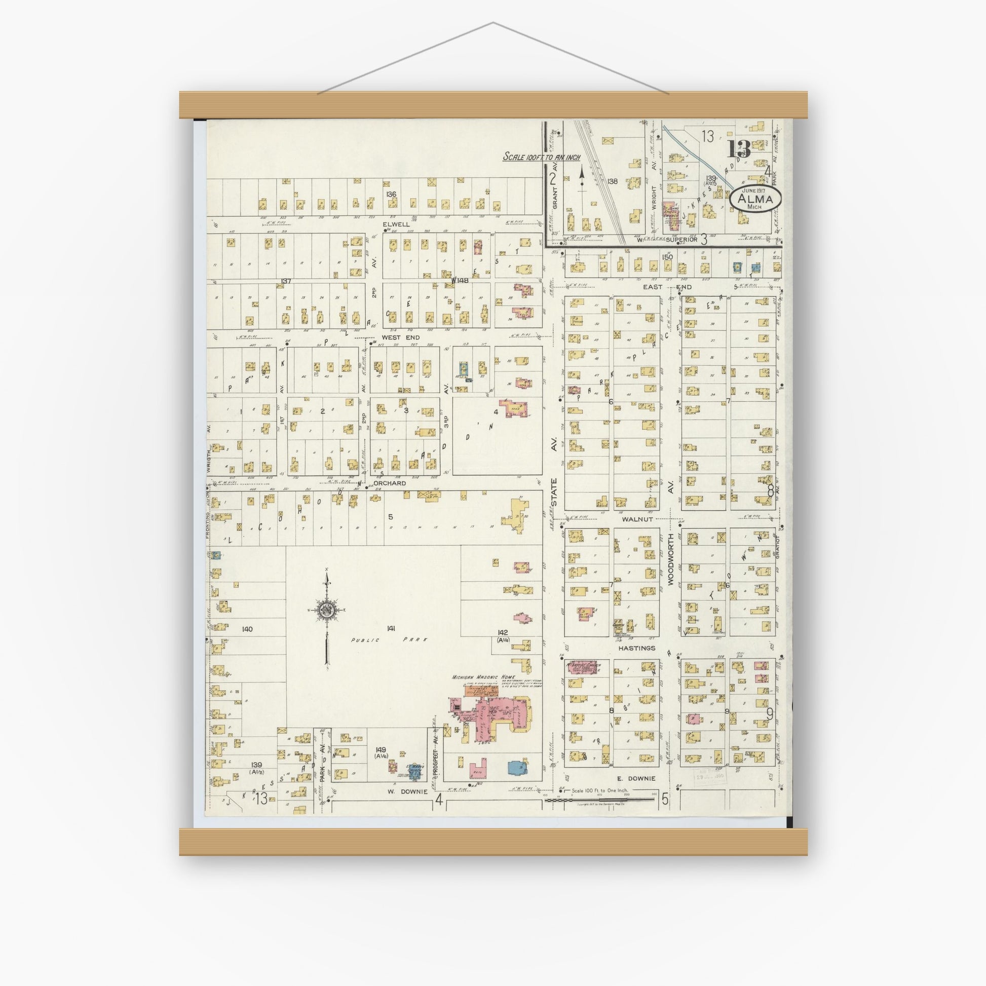 Old map wall art mockup — magnetic wood frame on white wall — Sanborn Fire Insurance Map from Alma, Gratiot County, Michigan (1917), Sheet #0013