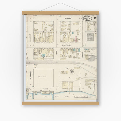 Old map wall art mockup — magnetic wood frame on white wall — Sanborn Fire Insurance Map from Cadillac, Wexford County, Michigan (1884), Sheet #0002