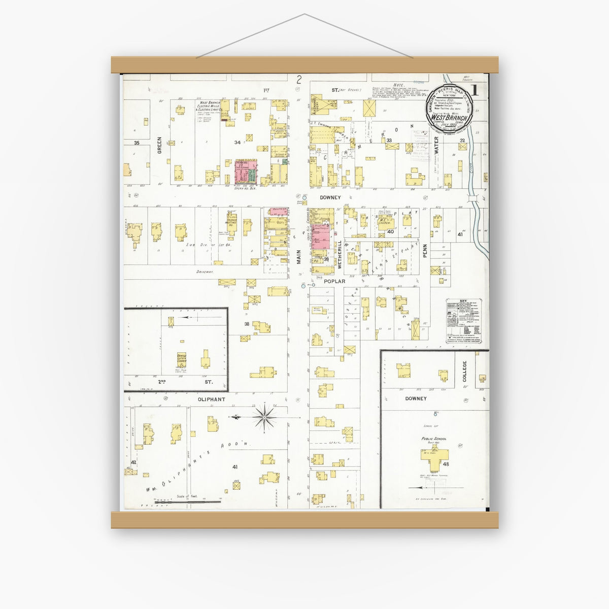Old map wall art mockup — magnetic wood frame on white wall — Sanborn Fire Insurance Map from West Branch, Cedar County, Iowa (1900) â€” Complete Set