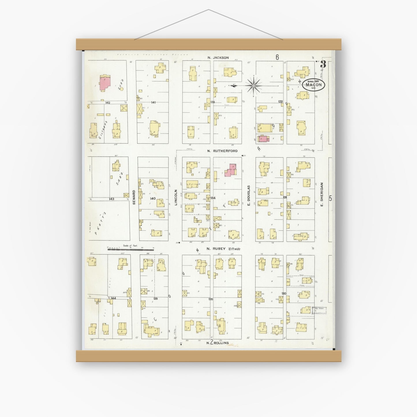 Old map wall art mockup — magnetic wood frame on white wall — Sanborn Fire Insurance Map from Macon, Macon County, Missouri (1909), Sheet #0003
