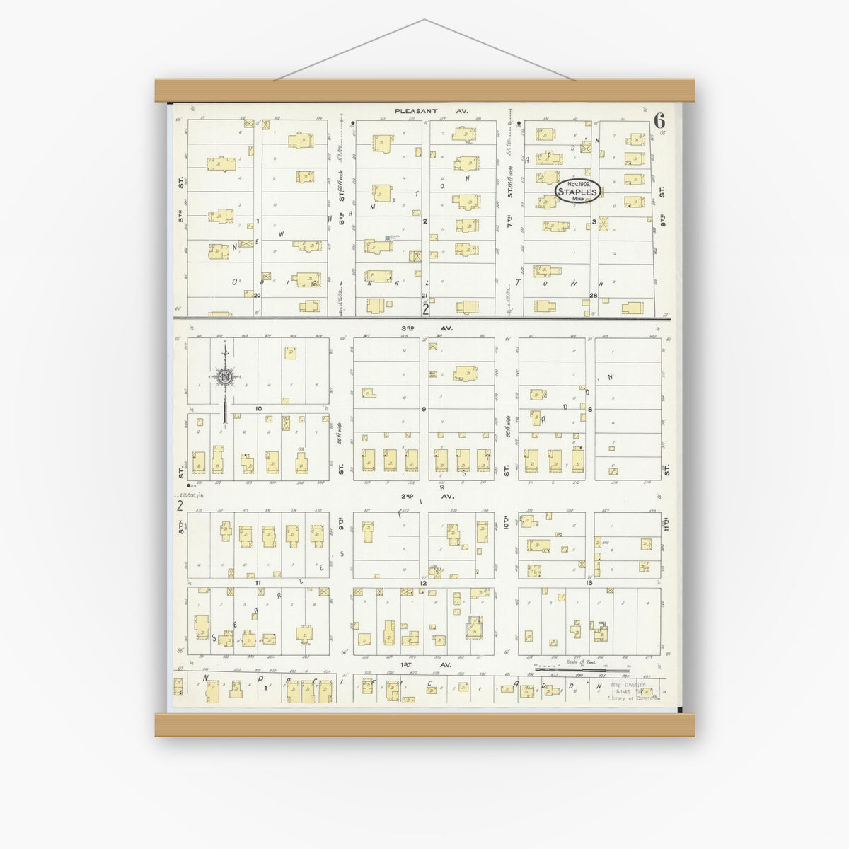 Old map wall art mockup — magnetic wood frame on white wall — Sanborn Fire Insurance Map from Staples, Todd County, Minnesota (1909), Sheet #0006