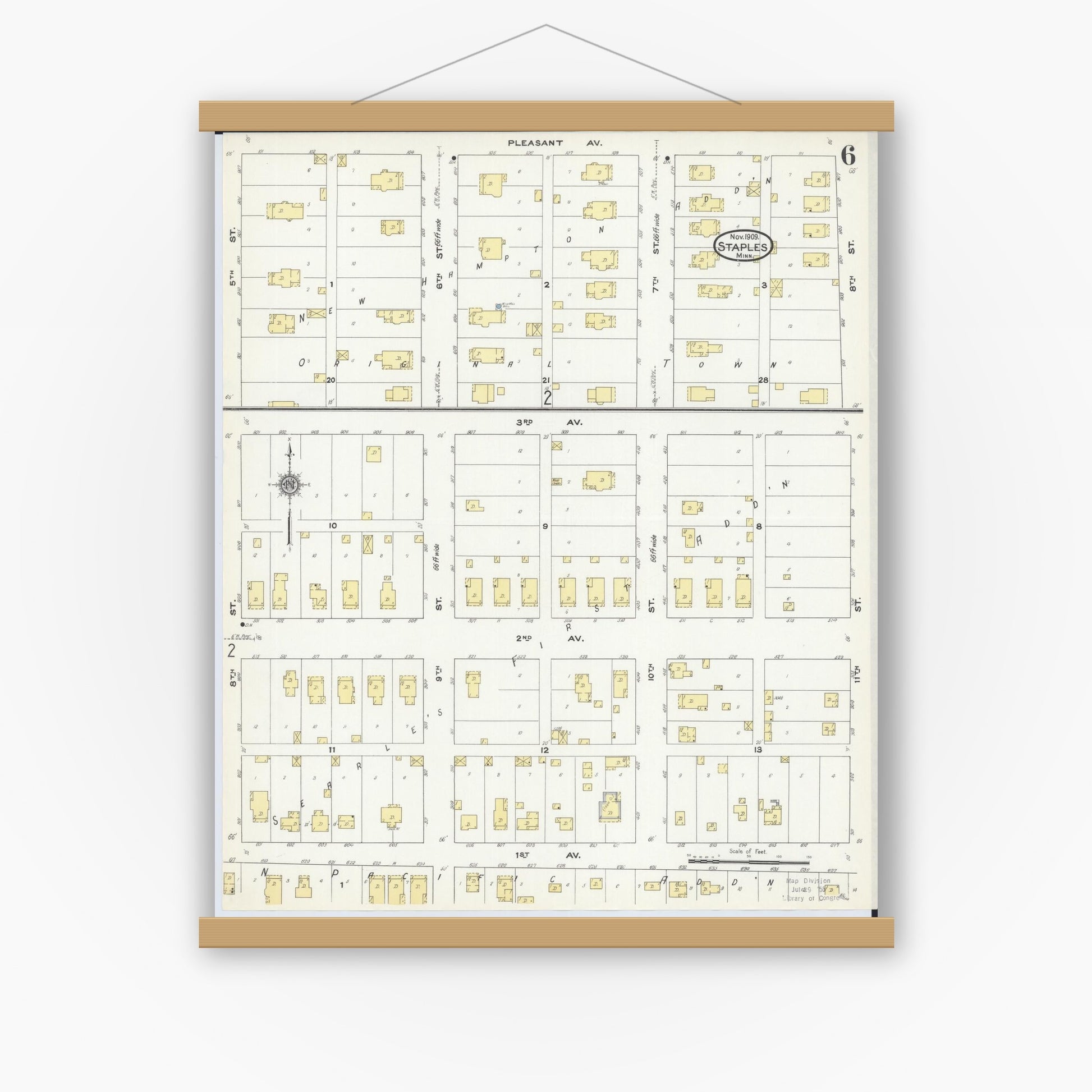 Old map wall art mockup — magnetic wood frame on white wall — Sanborn Fire Insurance Map from Staples, Todd County, Minnesota (1909), Sheet #0006