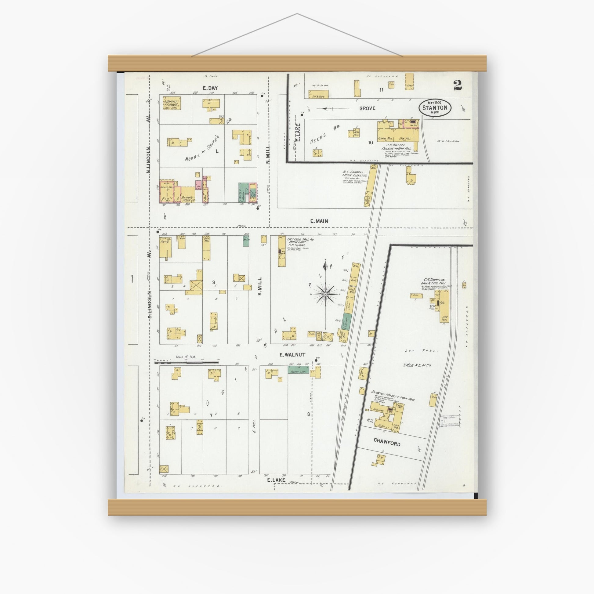 Old map wall art mockup — magnetic wood frame on white wall — Sanborn Fire Insurance Map from Stanton, Montcalm County, Michigan (1900), Sheet #0002