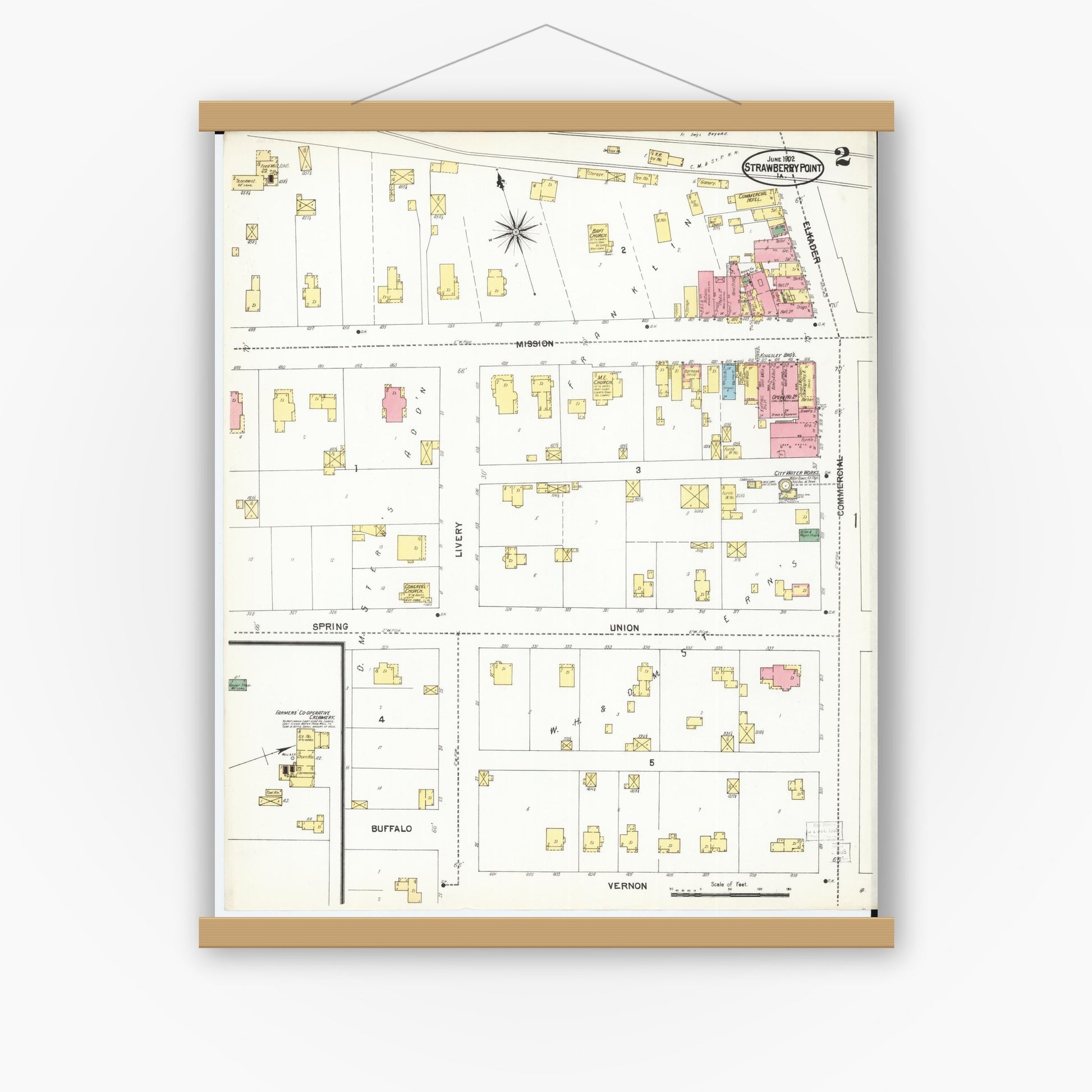 Old map wall art mockup — magnetic wood frame on white wall — Sanborn Fire Insurance Map from Strawberry Point, Clayton County, Iowa (1902), Sheet #0002
