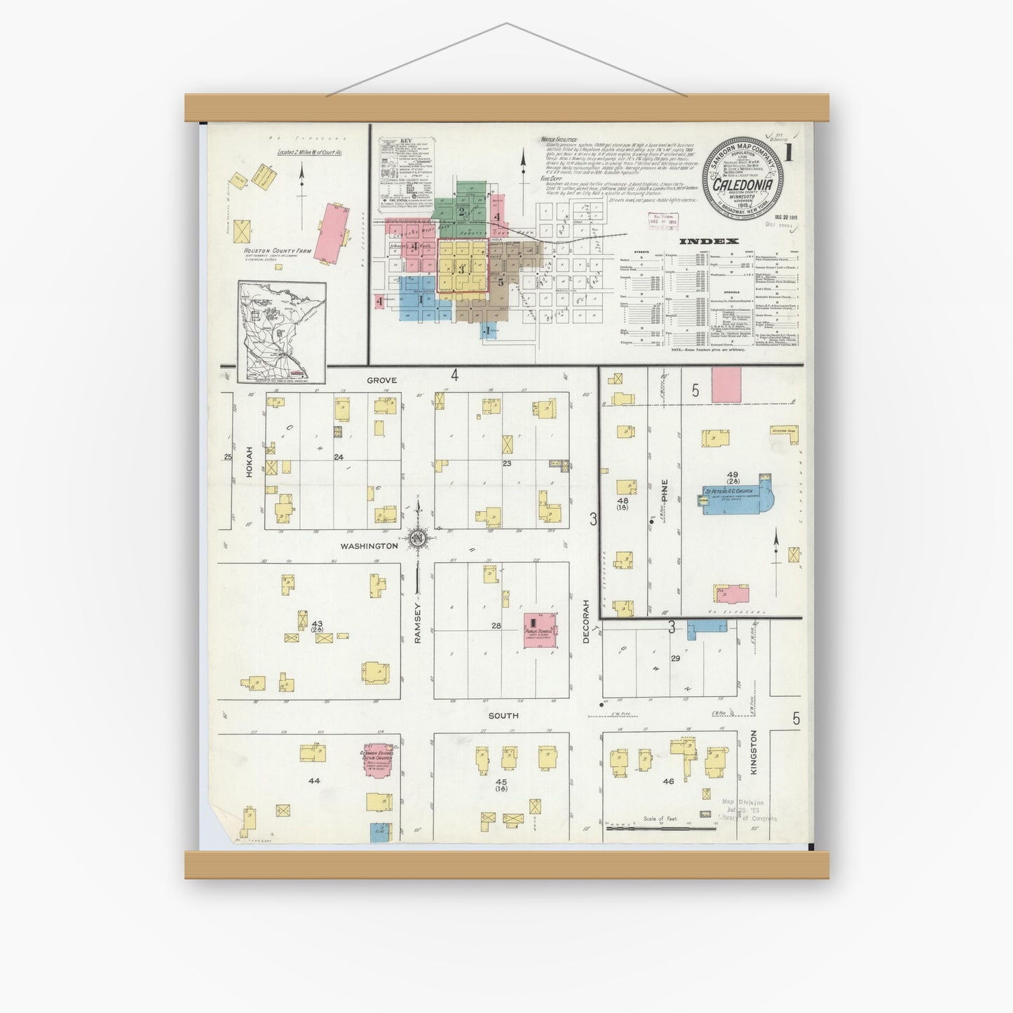 Old map wall art mockup — magnetic wood frame on white wall — Sanborn Fire Insurance Map from Caledonia, Houston County, Minnesota (1915), Sheet #0001