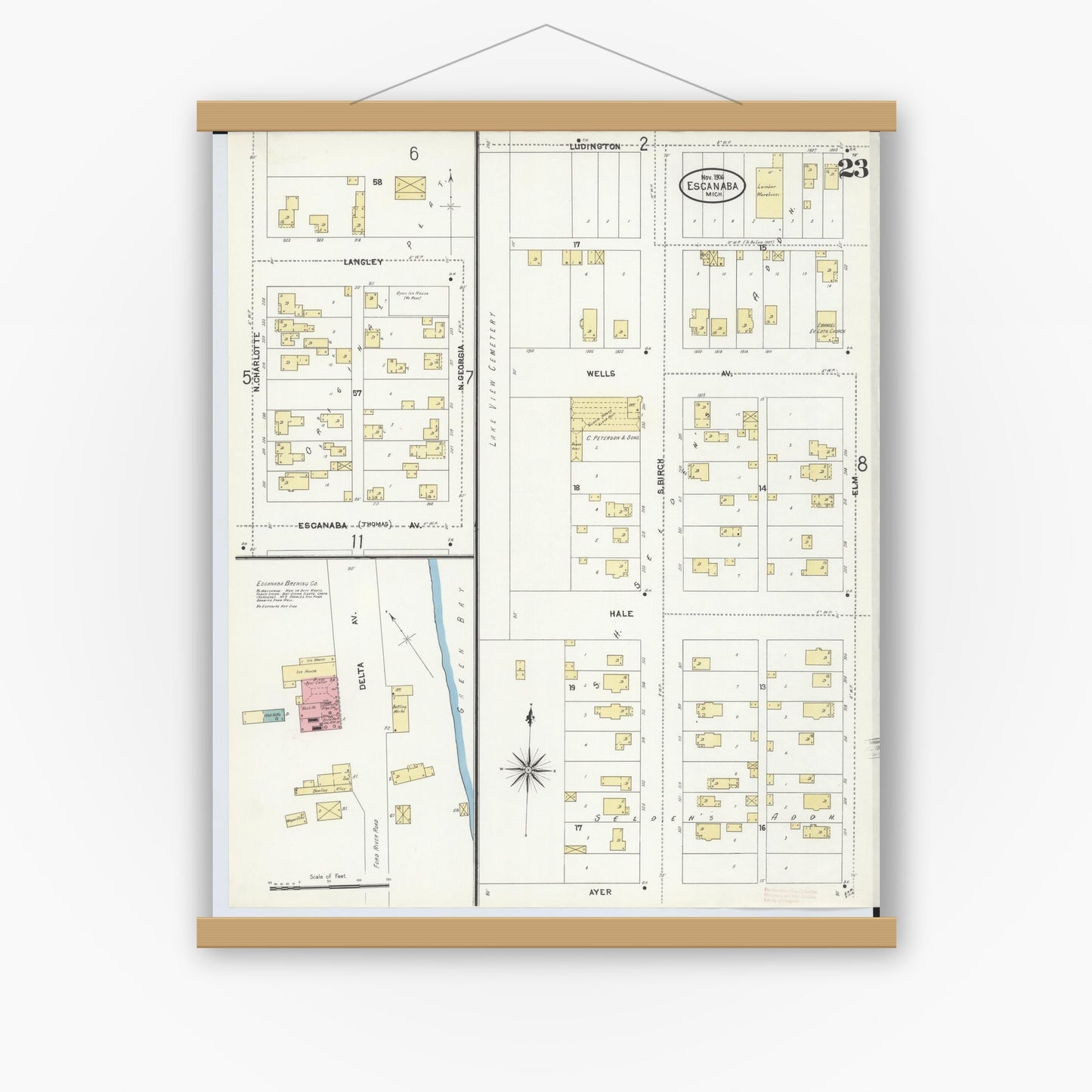 Old map wall art mockup — magnetic wood frame on white wall — Sanborn Fire Insurance Map from Escanaba, Delta County, Michigan (1906), Sheet #0023
