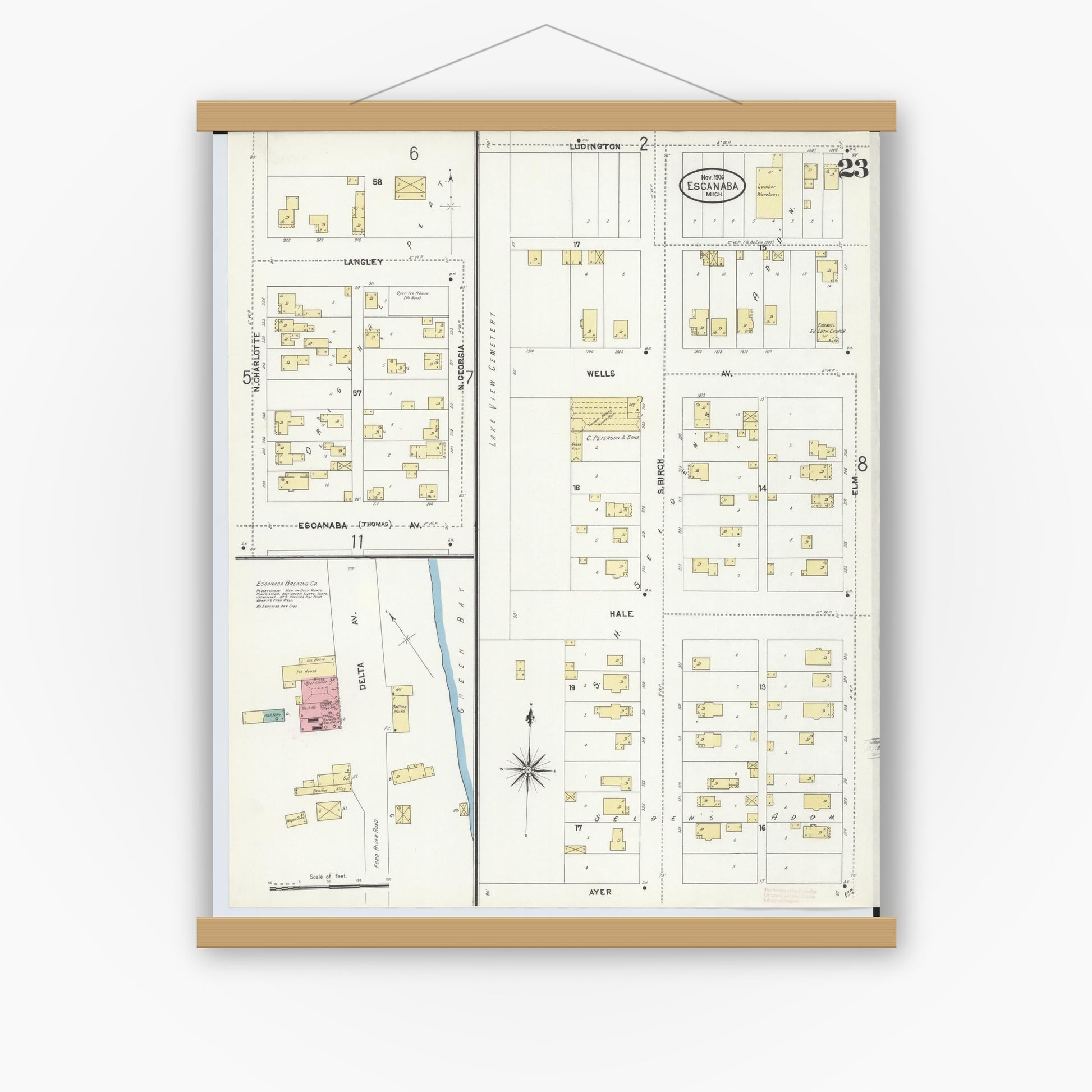 Old map wall art mockup — magnetic wood frame on white wall — Sanborn Fire Insurance Map from Escanaba, Delta County, Michigan (1906), Sheet #0023