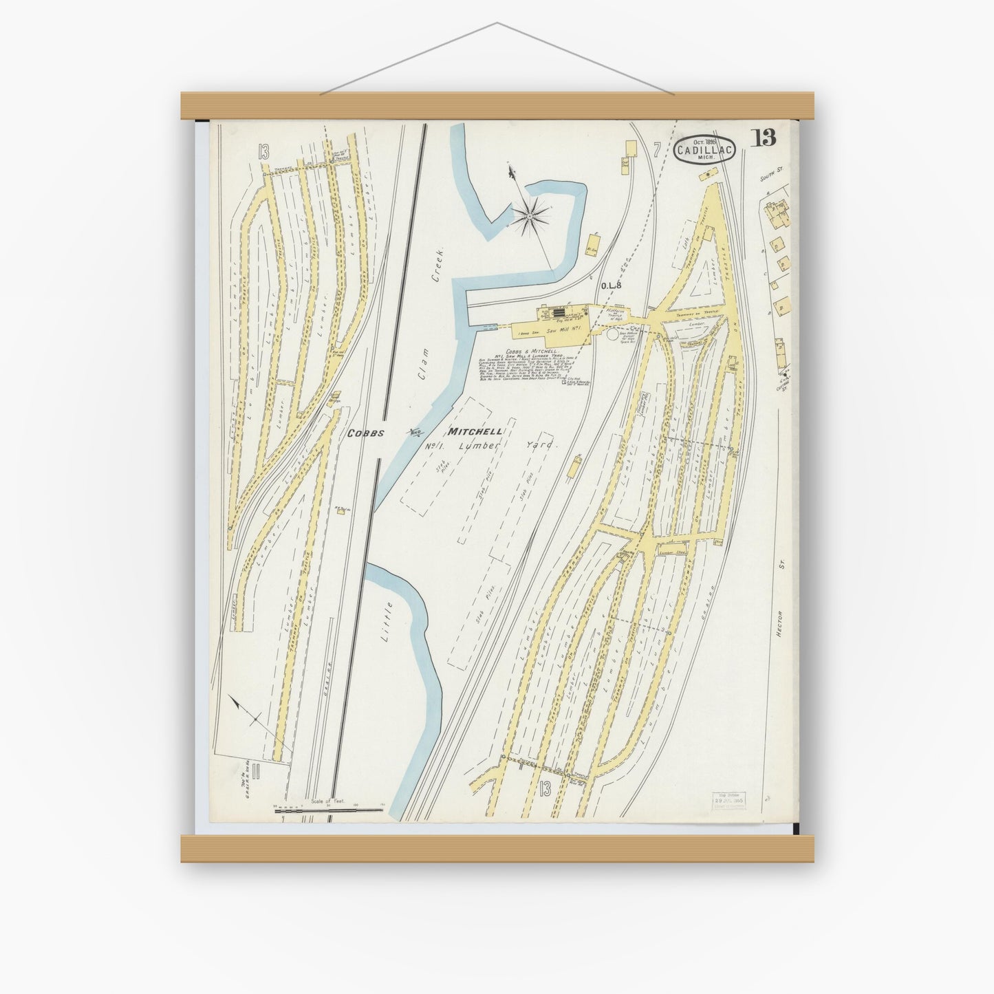 Old map wall art mockup — magnetic wood frame on white wall — Sanborn Fire Insurance Map from Cadillac, Wexford County, Michigan (1895), Sheet #0013