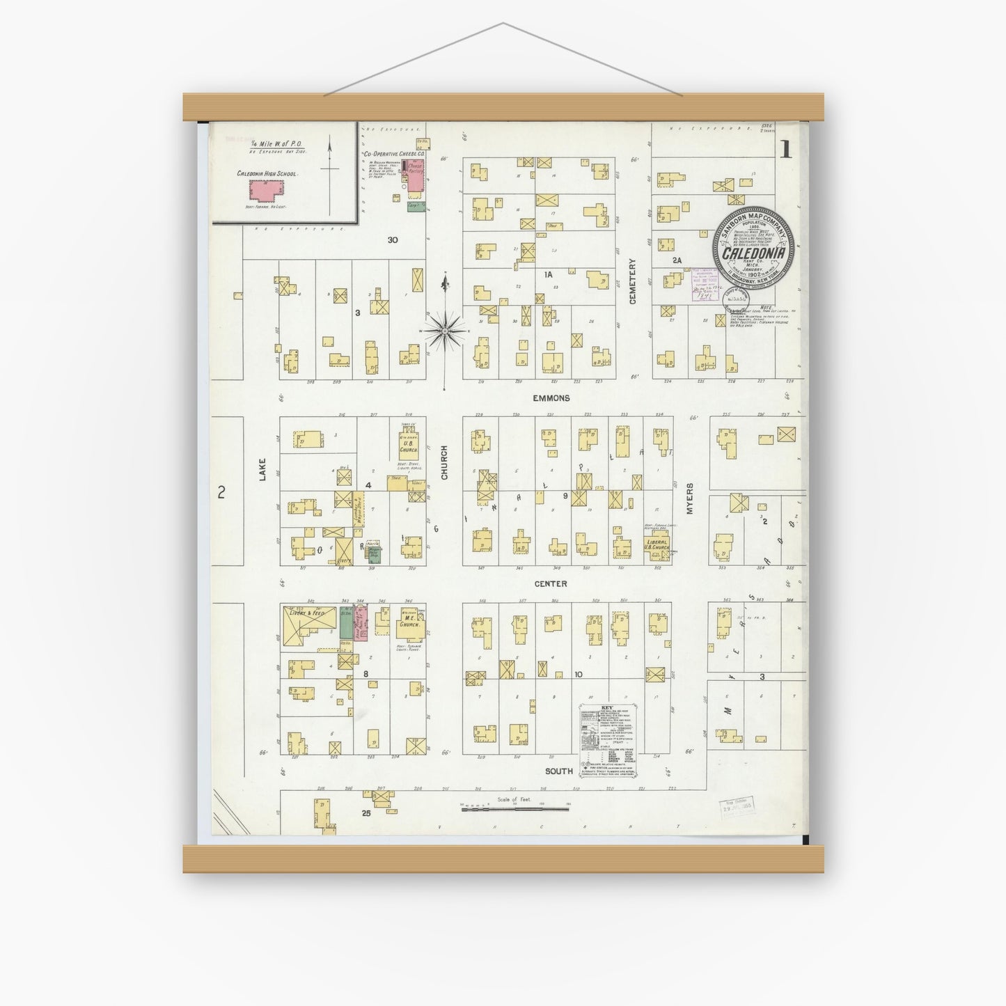 Old map wall art mockup — magnetic wood frame on white wall — Sanborn Fire Insurance Map from Caledonia, Kent County, Michigan (1902), Sheet #0001