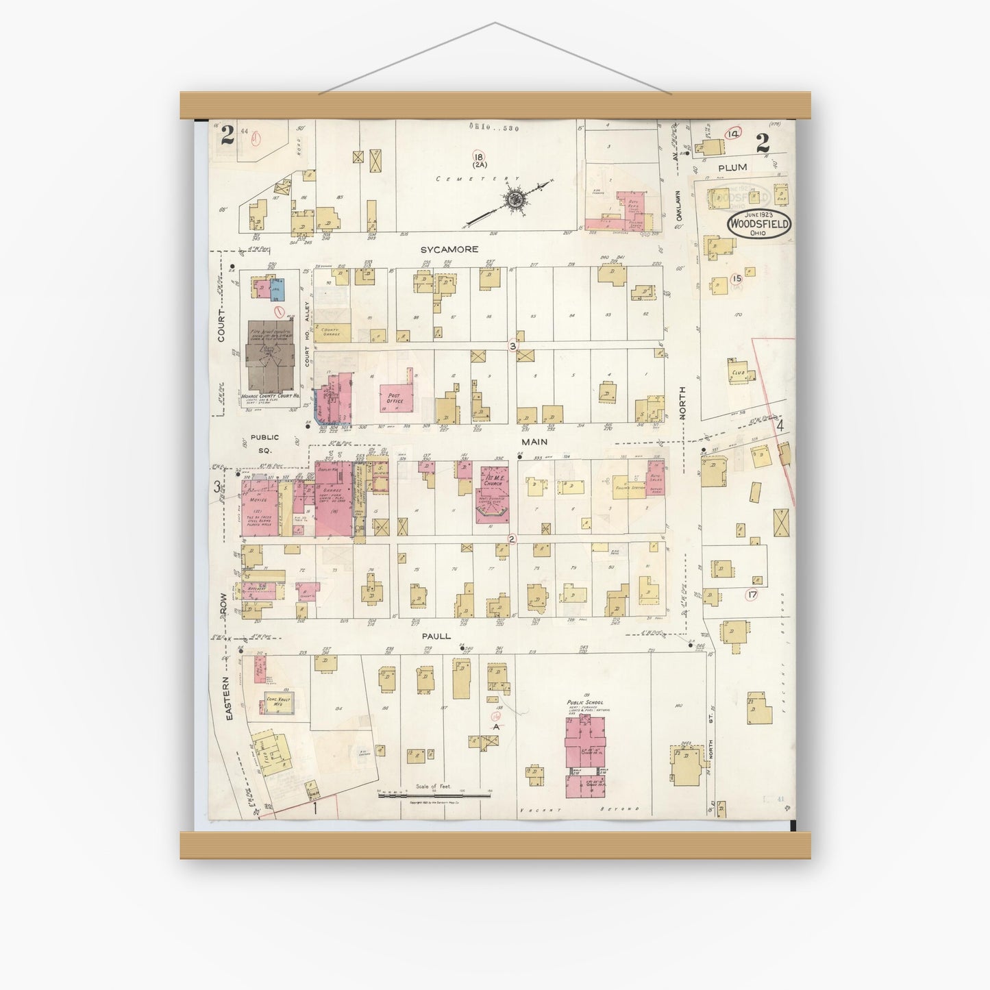 Old map wall art mockup — magnetic wood frame on white wall — Sanborn Fire Insurance Map from Woodsfield, Monroe County, Ohio (1949), Sheet #0002