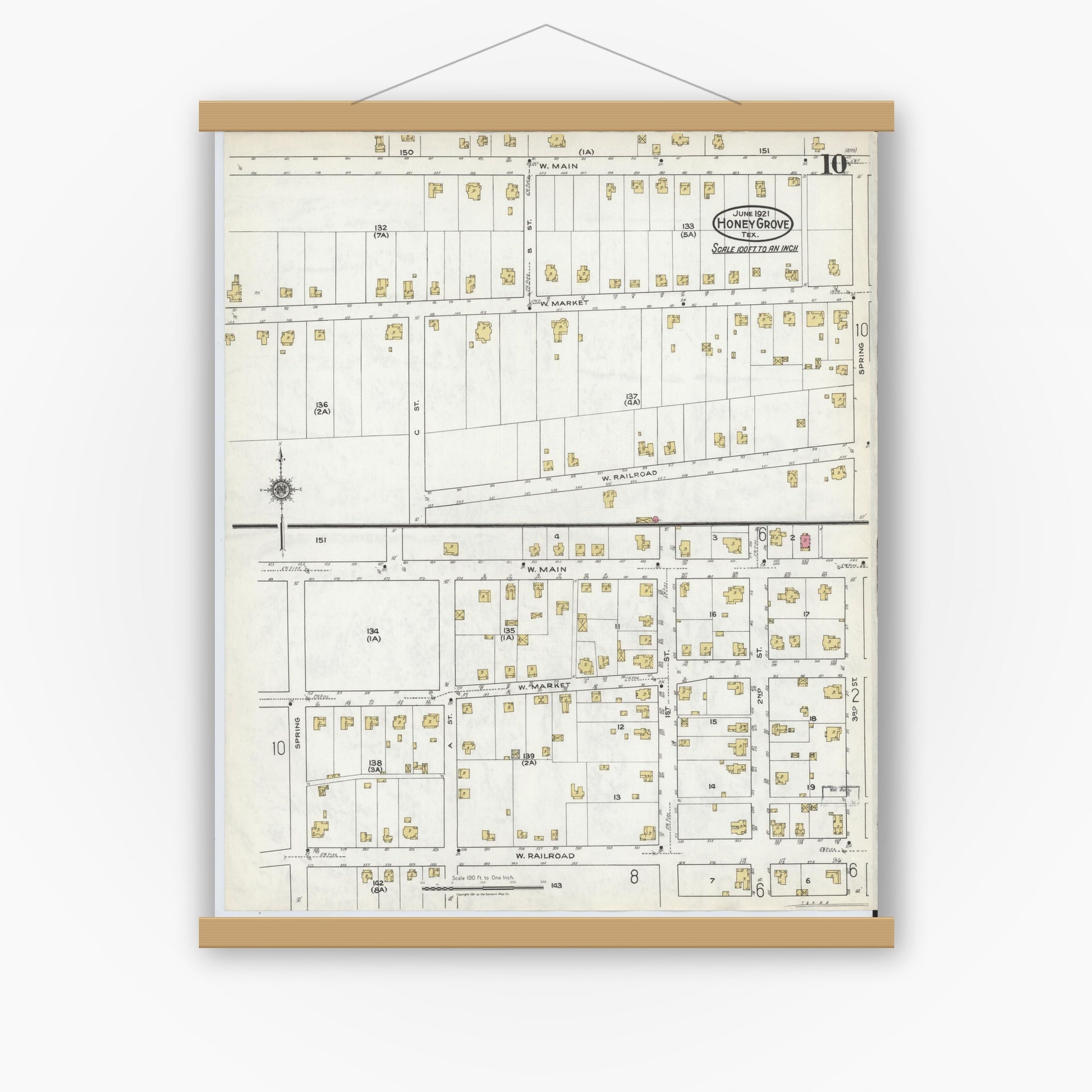 Old map wall art mockup — magnetic wood frame on white wall — Sanborn Fire Insurance Map from Honey Grove, Fannin County, Texas (1921), Sheet #0010