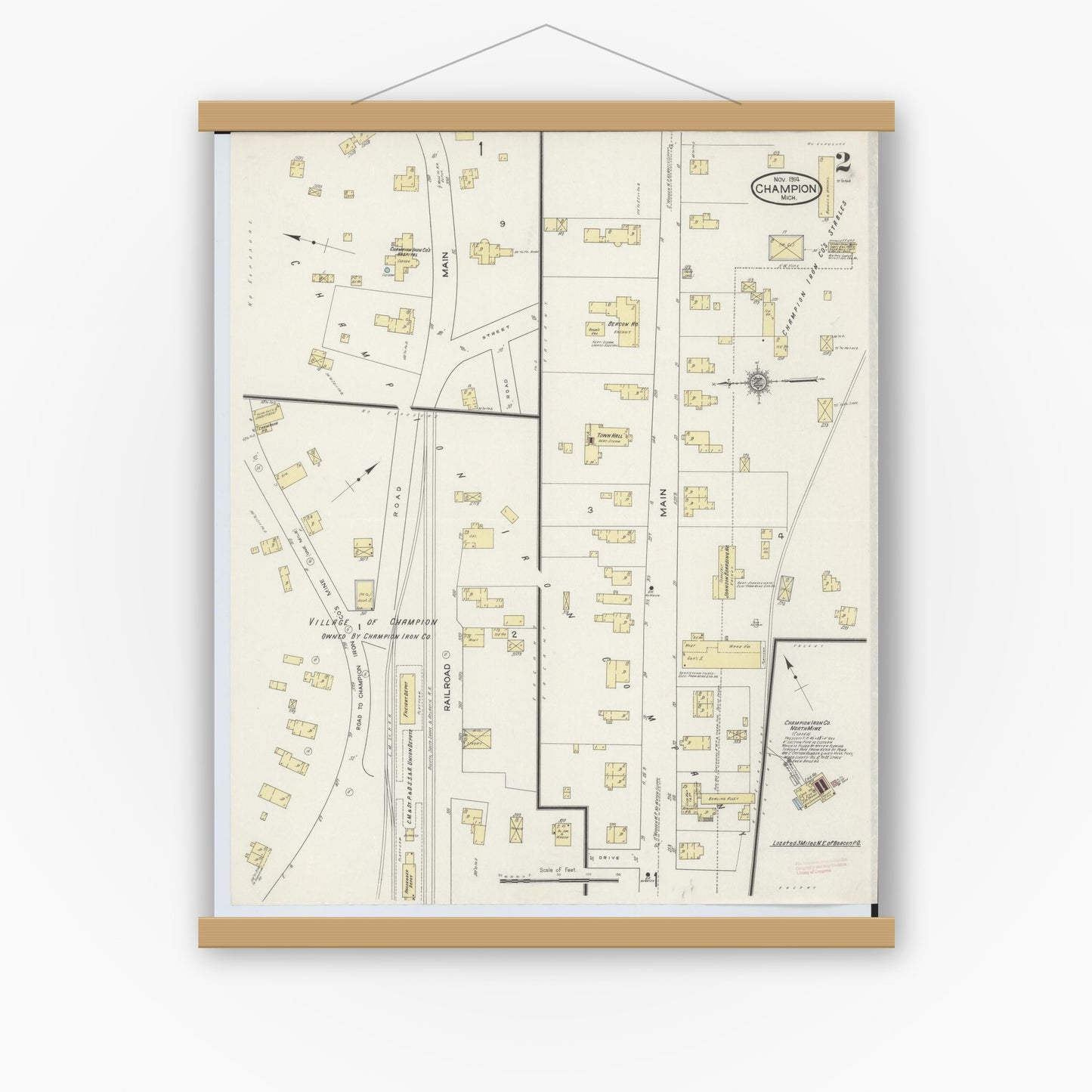 Old map wall art mockup — magnetic wood frame on white wall — Sanborn Fire Insurance Map from Champion, Marquette County, Michigan (1914), Sheet #0002