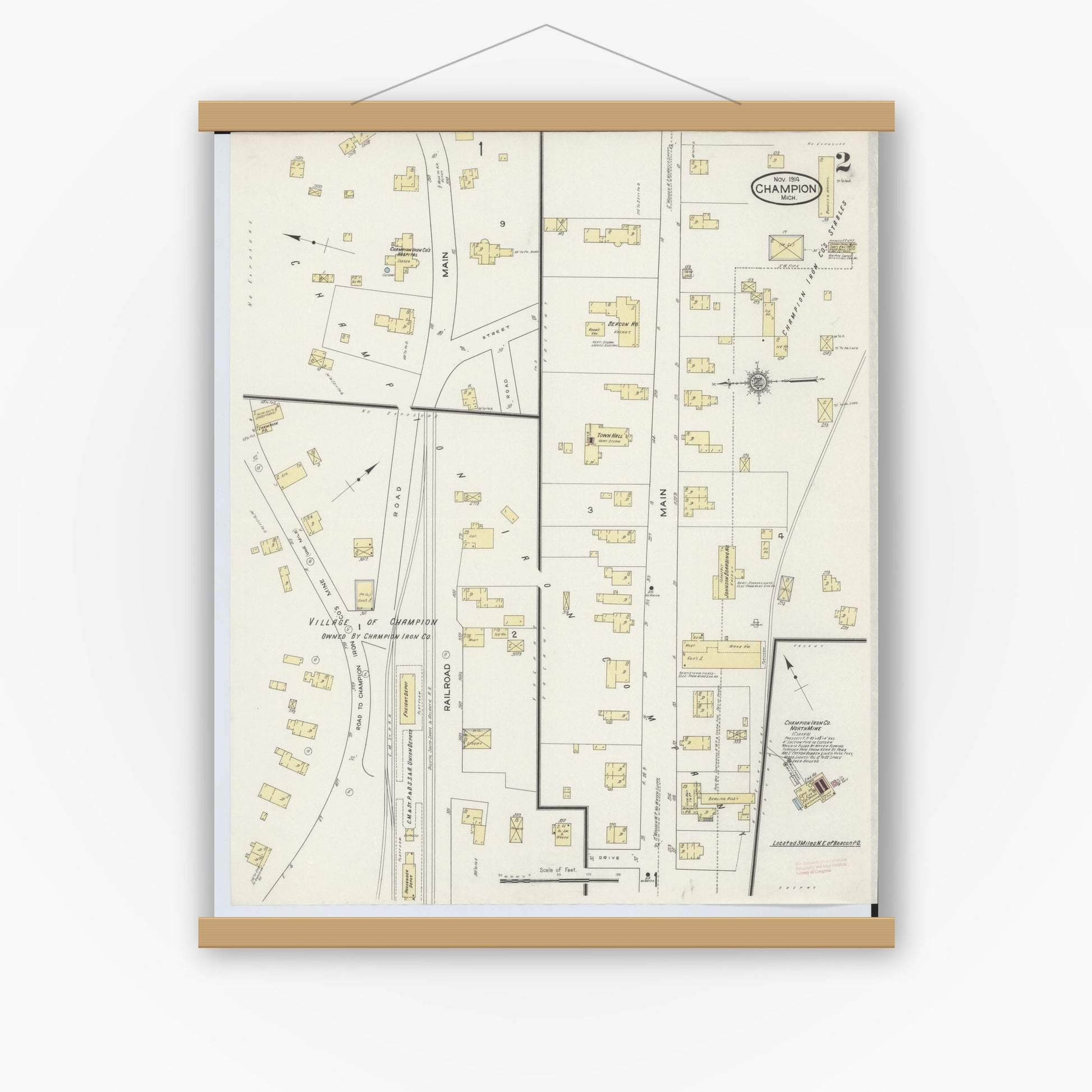 Old map wall art mockup — magnetic wood frame on white wall — Sanborn Fire Insurance Map from Champion, Marquette County, Michigan (1914), Sheet #0002