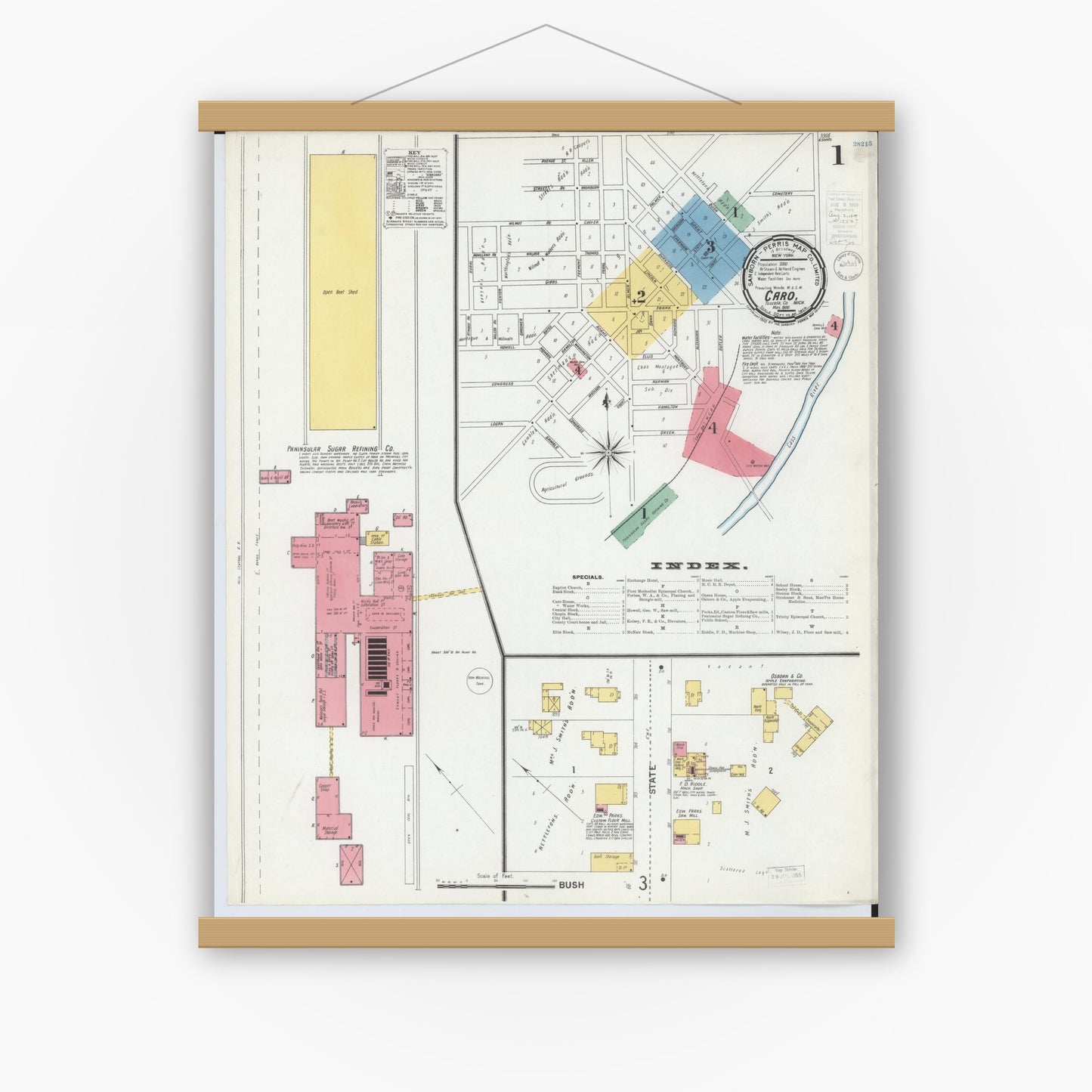 Old map wall art mockup — magnetic wood frame on white wall — Sanborn Fire Insurance Map from Caro, Tuscola County, Michigan (1900) - Complete Map Set