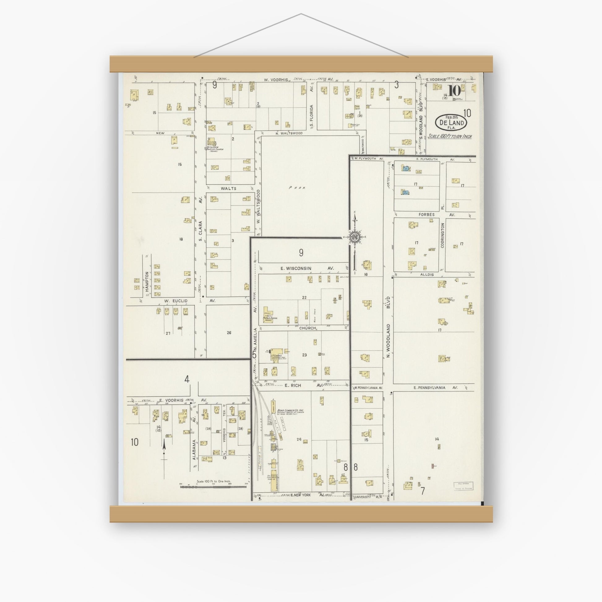 Old map wall art mockup — magnetic wood frame on white wall — Sanborn Fire Insurance Map from De Land, Volusia County, Florida (1915), Sheet #0010