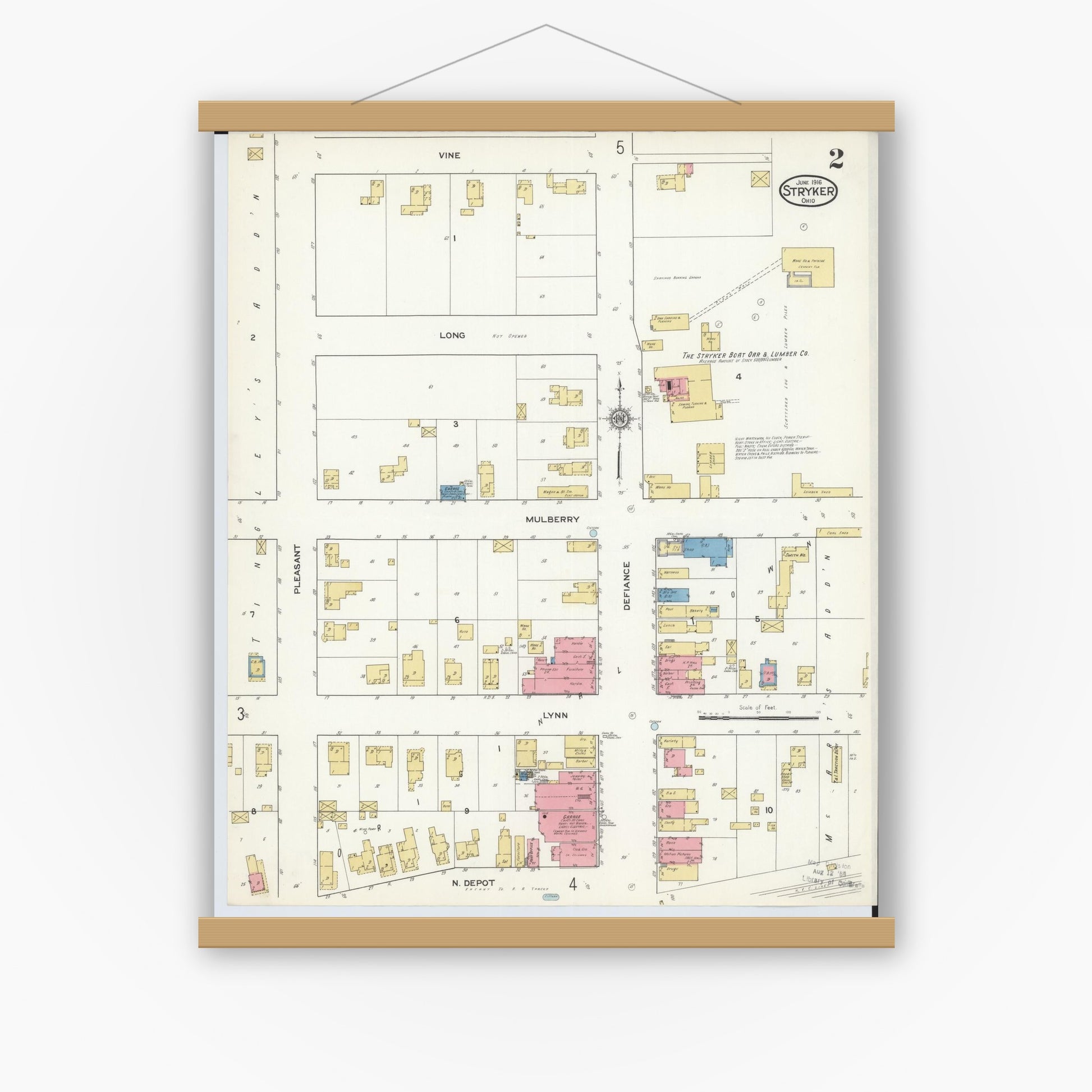 Old map wall art mockup — magnetic wood frame on white wall — Sanborn Fire Insurance Map from Stryker, Williams County, Ohio (1916), Sheet #0002