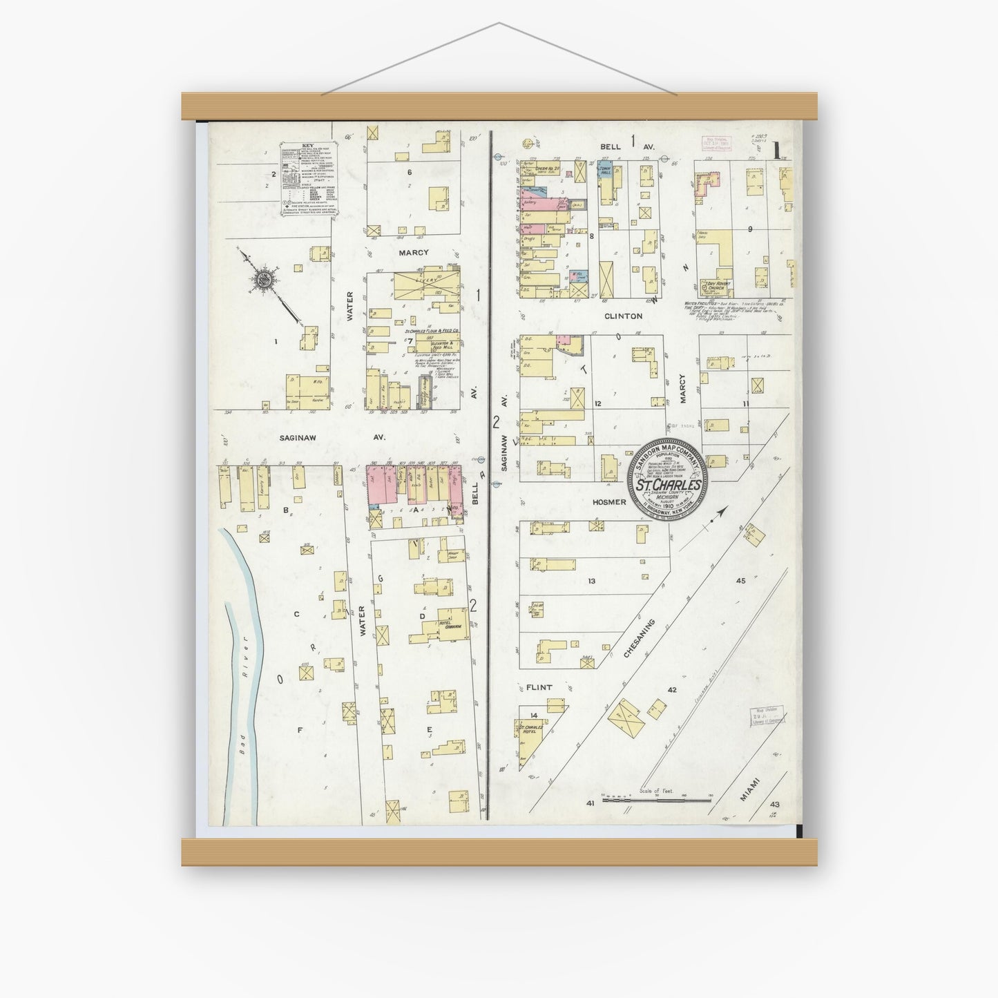 Old map wall art mockup — magnetic wood frame on white wall — Sanborn Fire Insurance Map from Saint Charles, Saginaw County, Michigan (1910) - Complete Map Set
