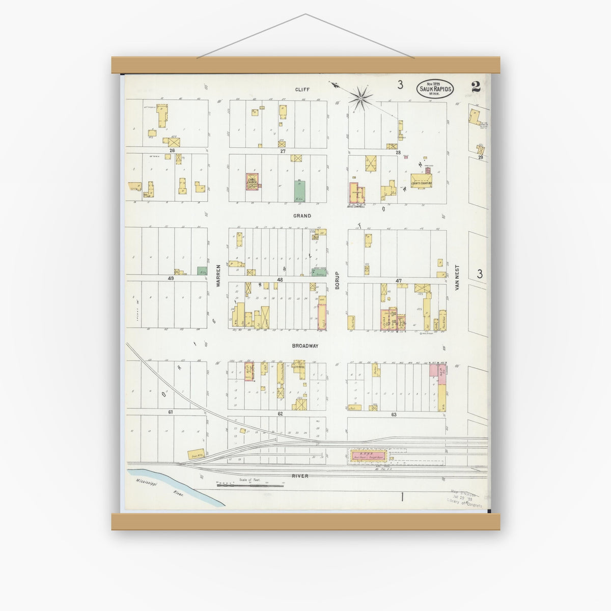 Old map wall art mockup — magnetic wood frame on white wall — Sanborn Fire Insurance Map from Sauk Rapids, Benton County, Minnesota (1899), Sheet #0002