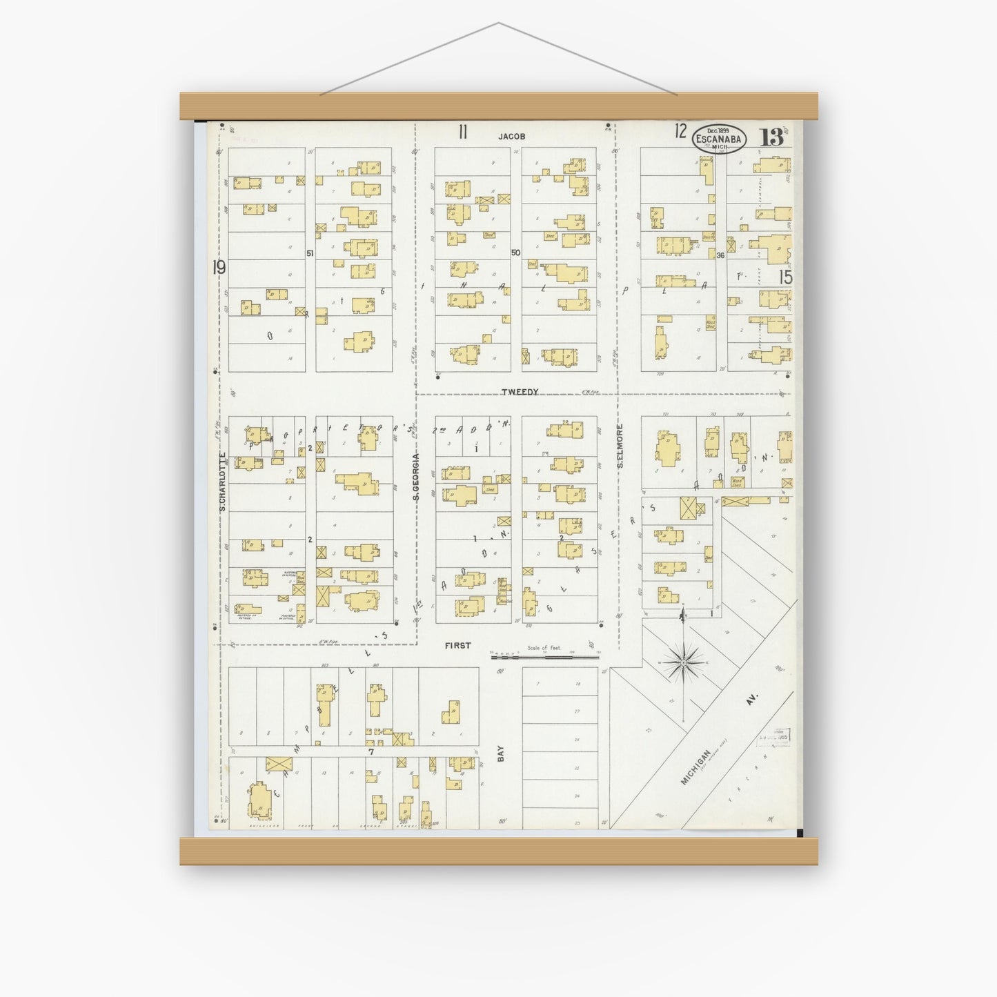 Old map wall art mockup — magnetic wood frame on white wall — Sanborn Fire Insurance Map from Escanaba, Delta County, Michigan (1899), Sheet #0013
