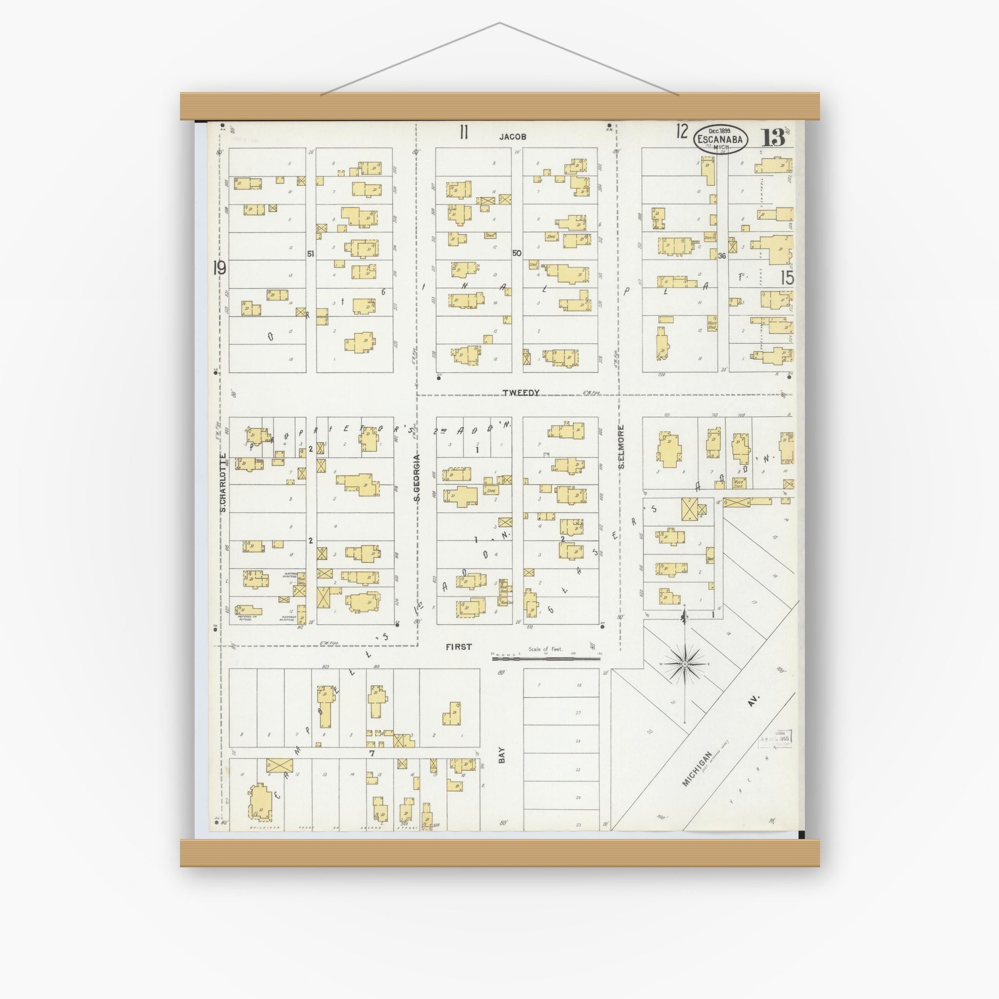 Old map wall art mockup — magnetic wood frame on white wall — Sanborn Fire Insurance Map from Escanaba, Delta County, Michigan (1899), Sheet #0013
