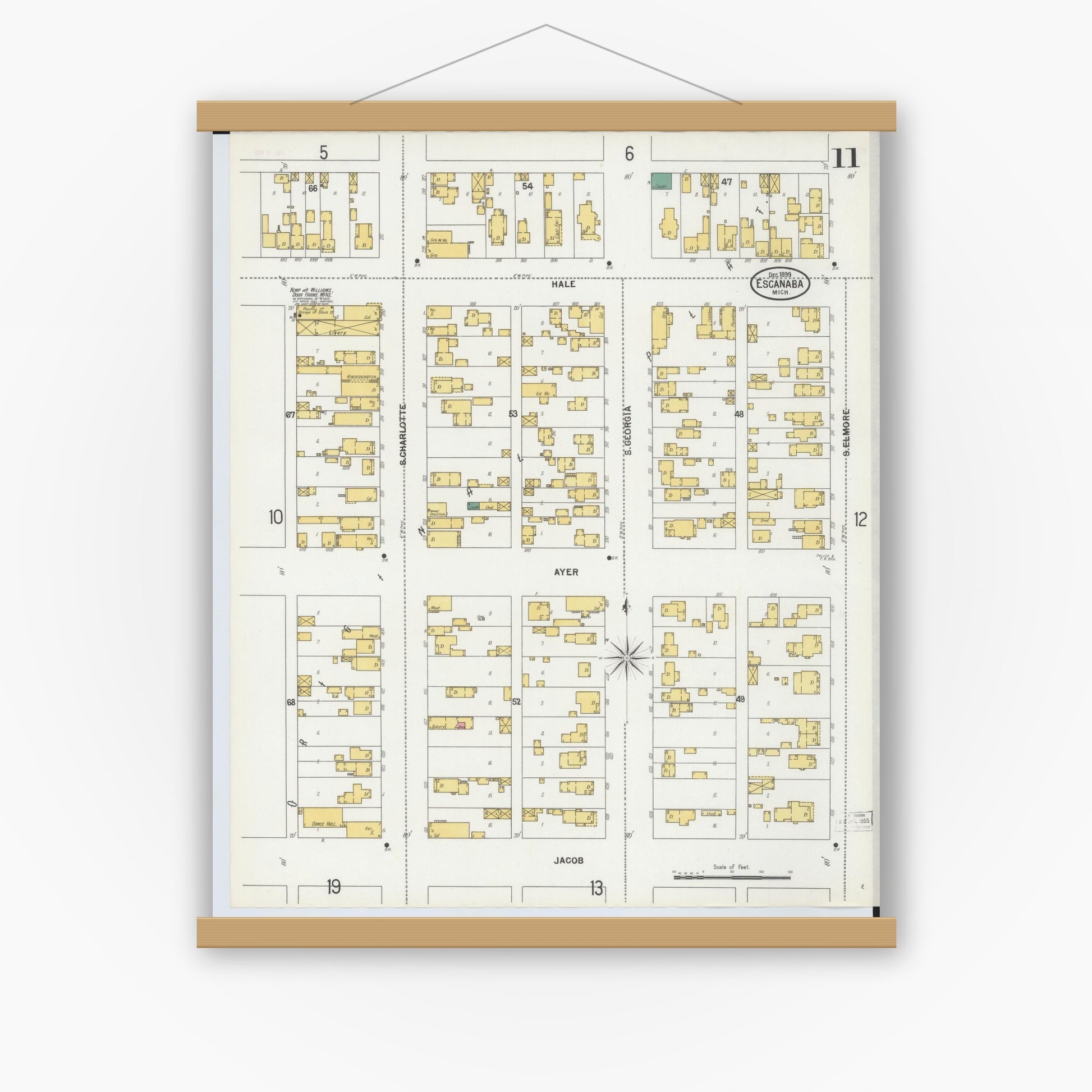 Old map wall art mockup — magnetic wood frame on white wall — Sanborn Fire Insurance Map from Escanaba, Delta County, Michigan (1899), Sheet #0011